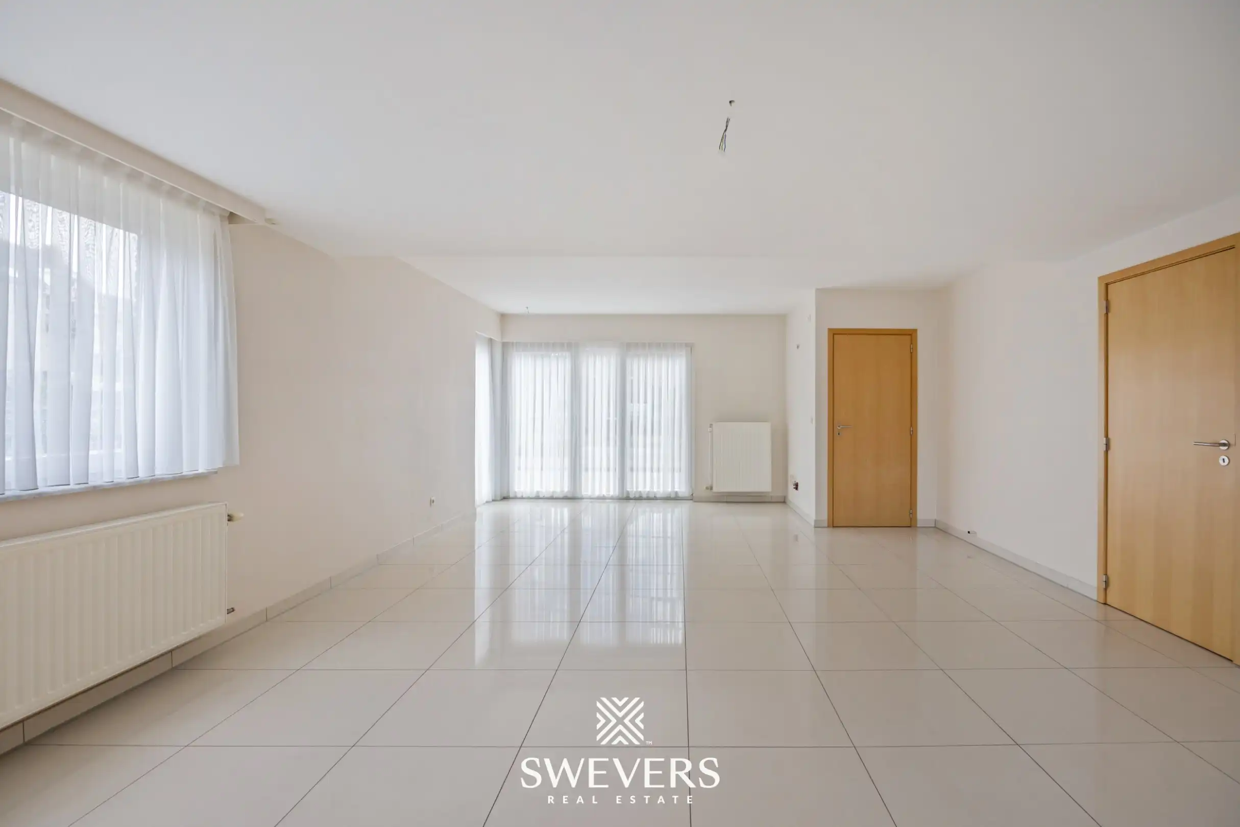 Uitstekend gelegen gelijkvloers appartement met 2 slaapkamers en private tuin foto 4