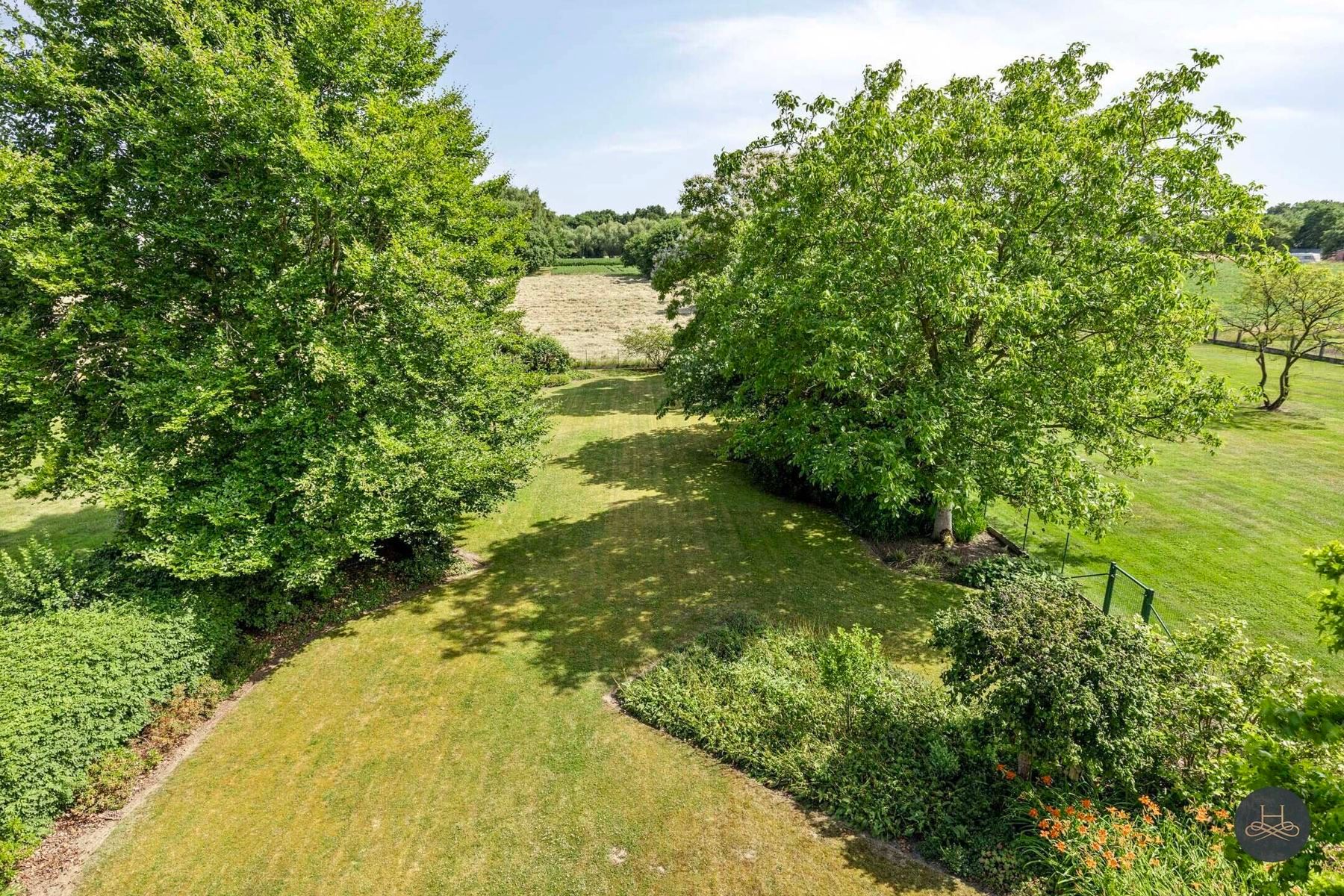 Ruime gezinswoning met ruime tuin en prachtig uitzicht foto 28