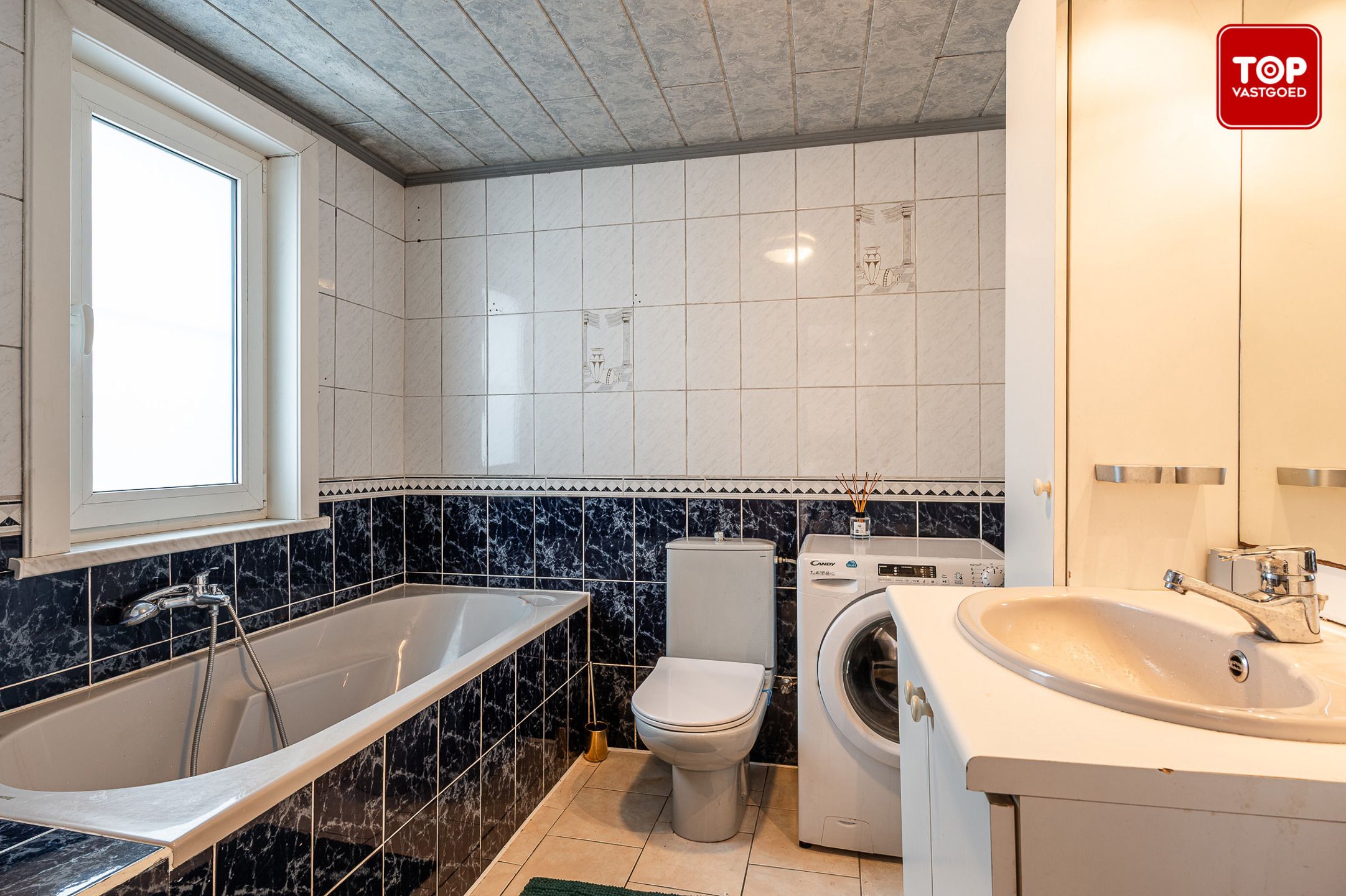 Charmante woning nabij het centrum van Drongen foto 9