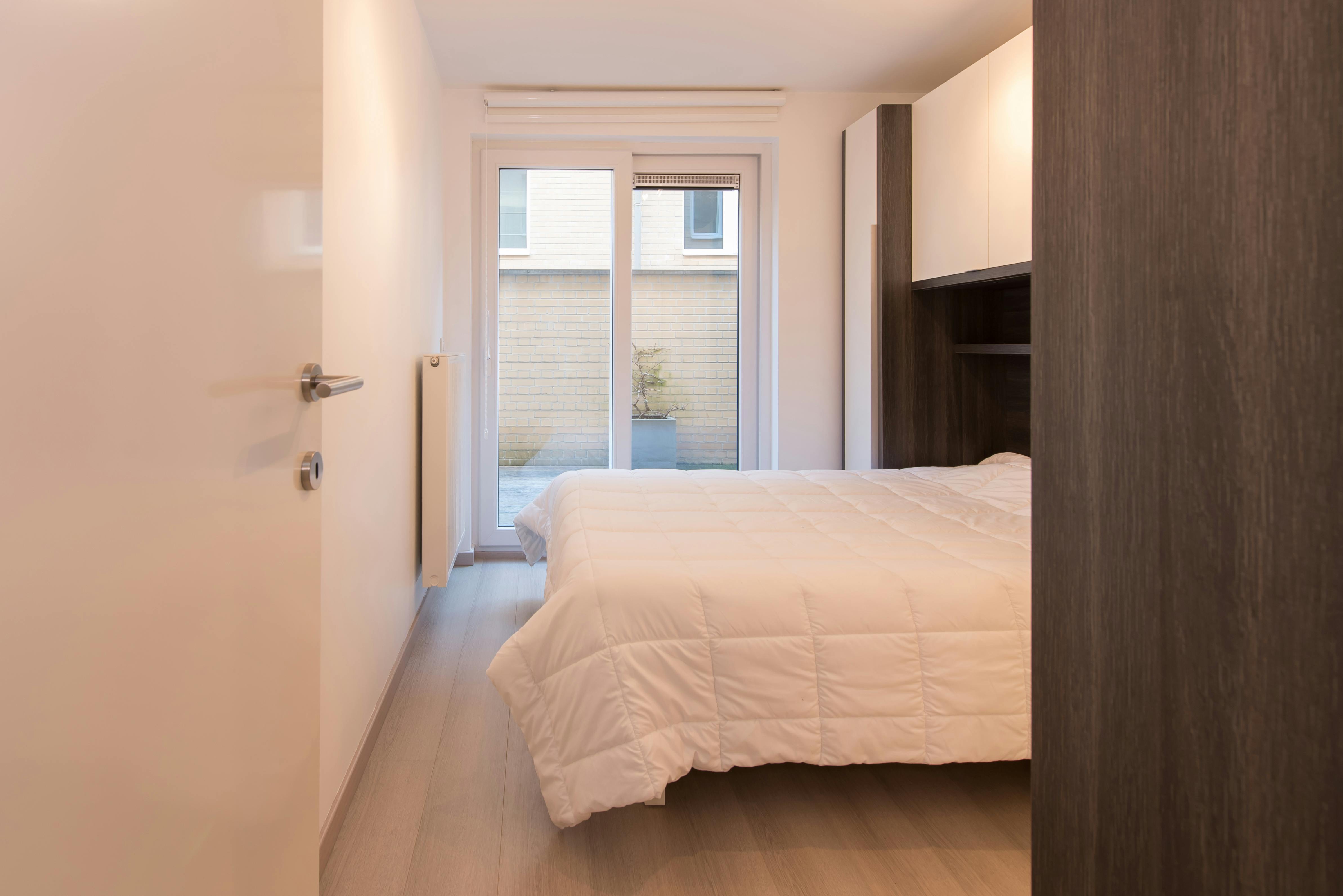 Recent gelijkvloers appartement met 2 slaapkamers en terras! foto 8