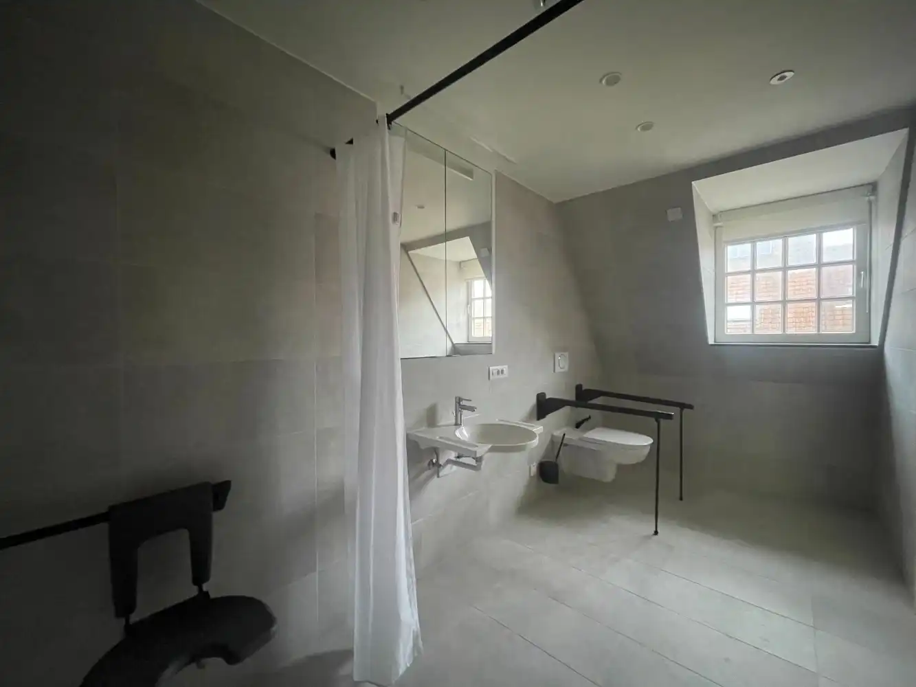 Gezellige assistentieflat met 1 slaapkamer en zicht op de tuin foto 9