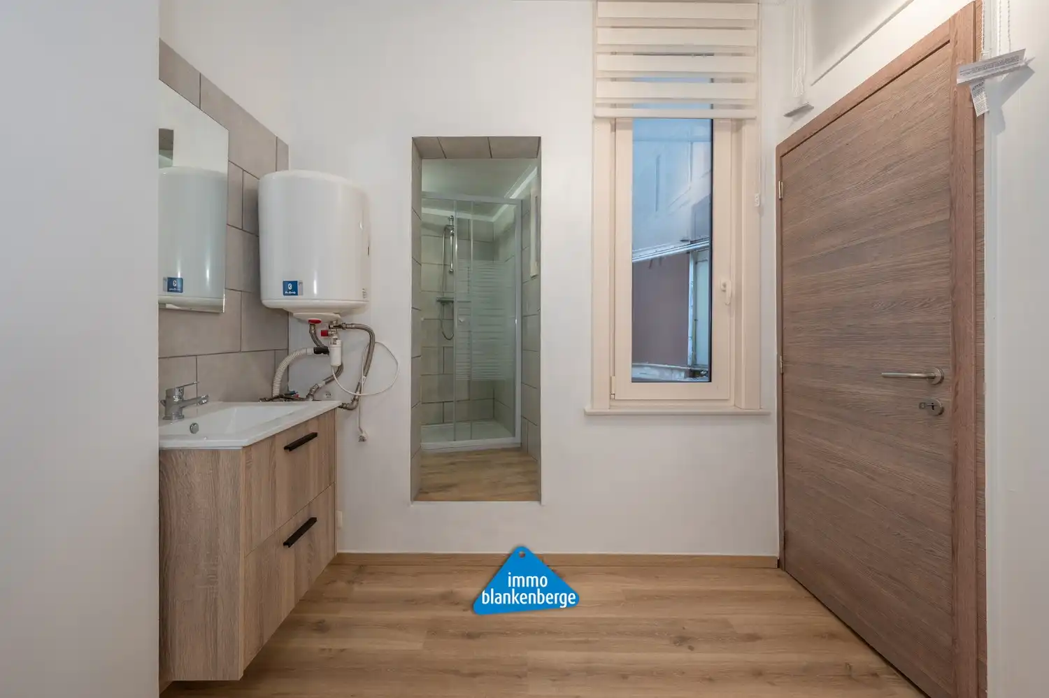 Volledig gerenoveerde rijwoning met één slaapkamer foto 12