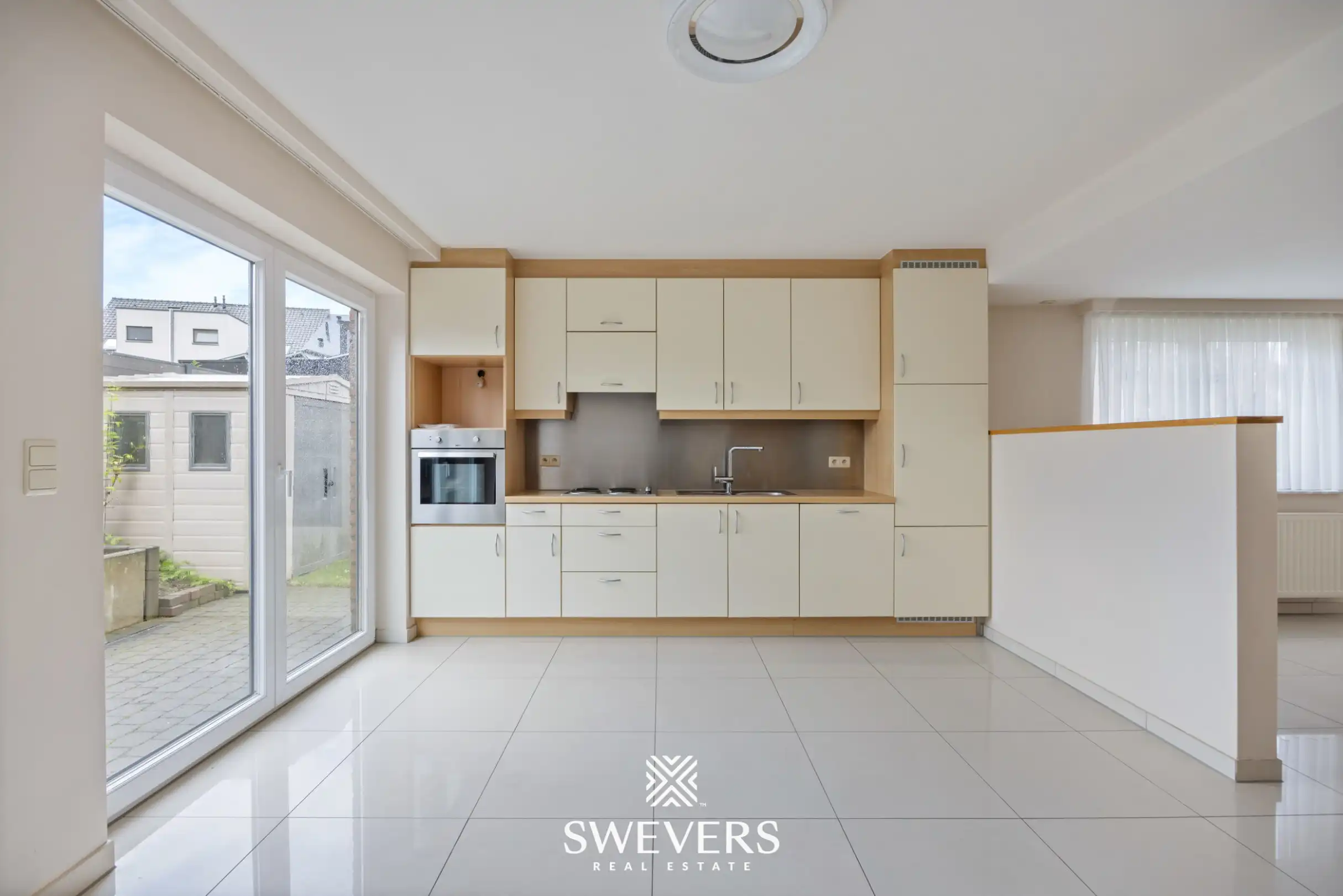 Uitstekend gelegen gelijkvloers appartement met 2 slaapkamers en private tuin foto 8