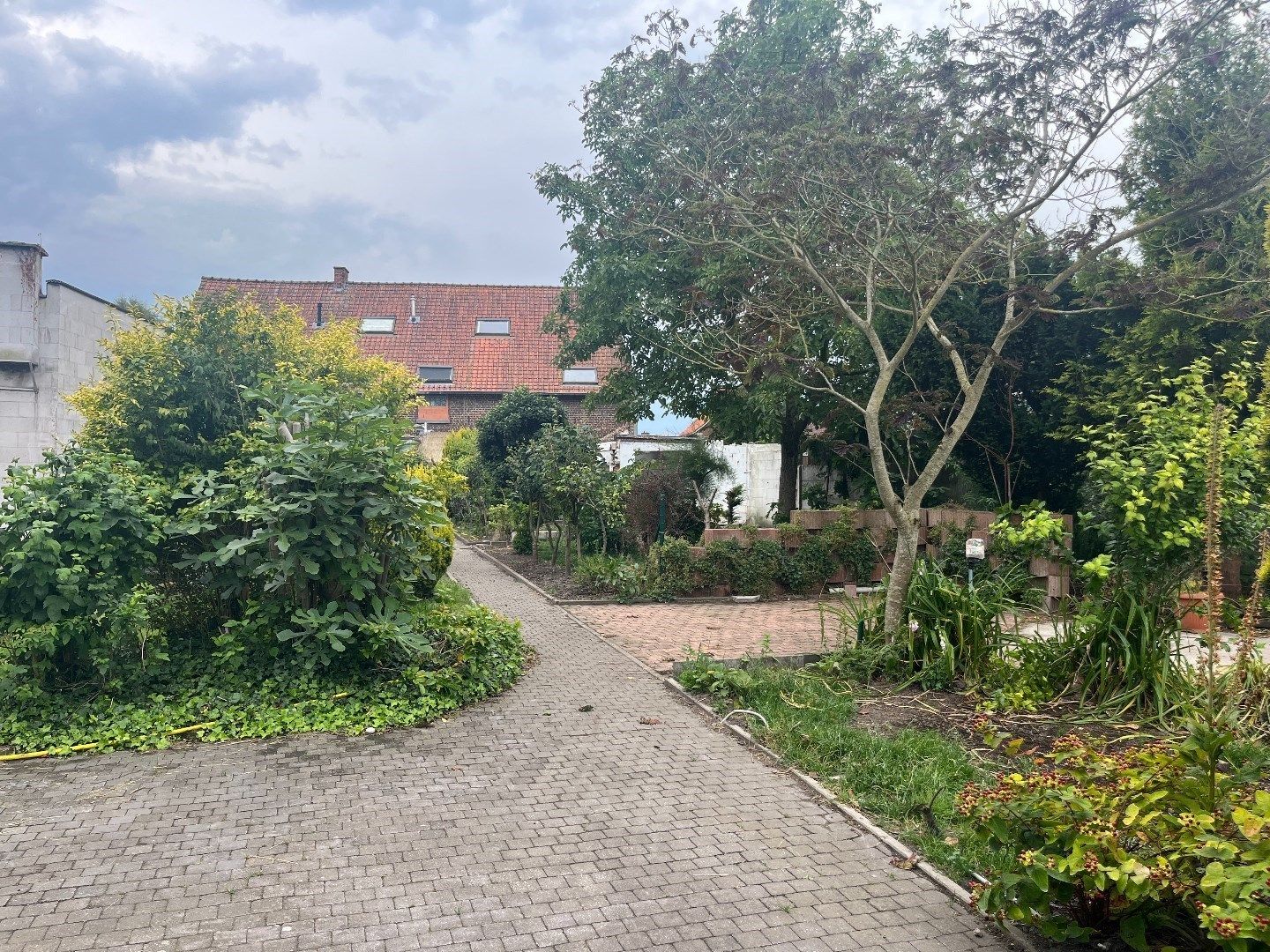 Halfopen woning met ruime loods +-480 m² te koop! foto 26