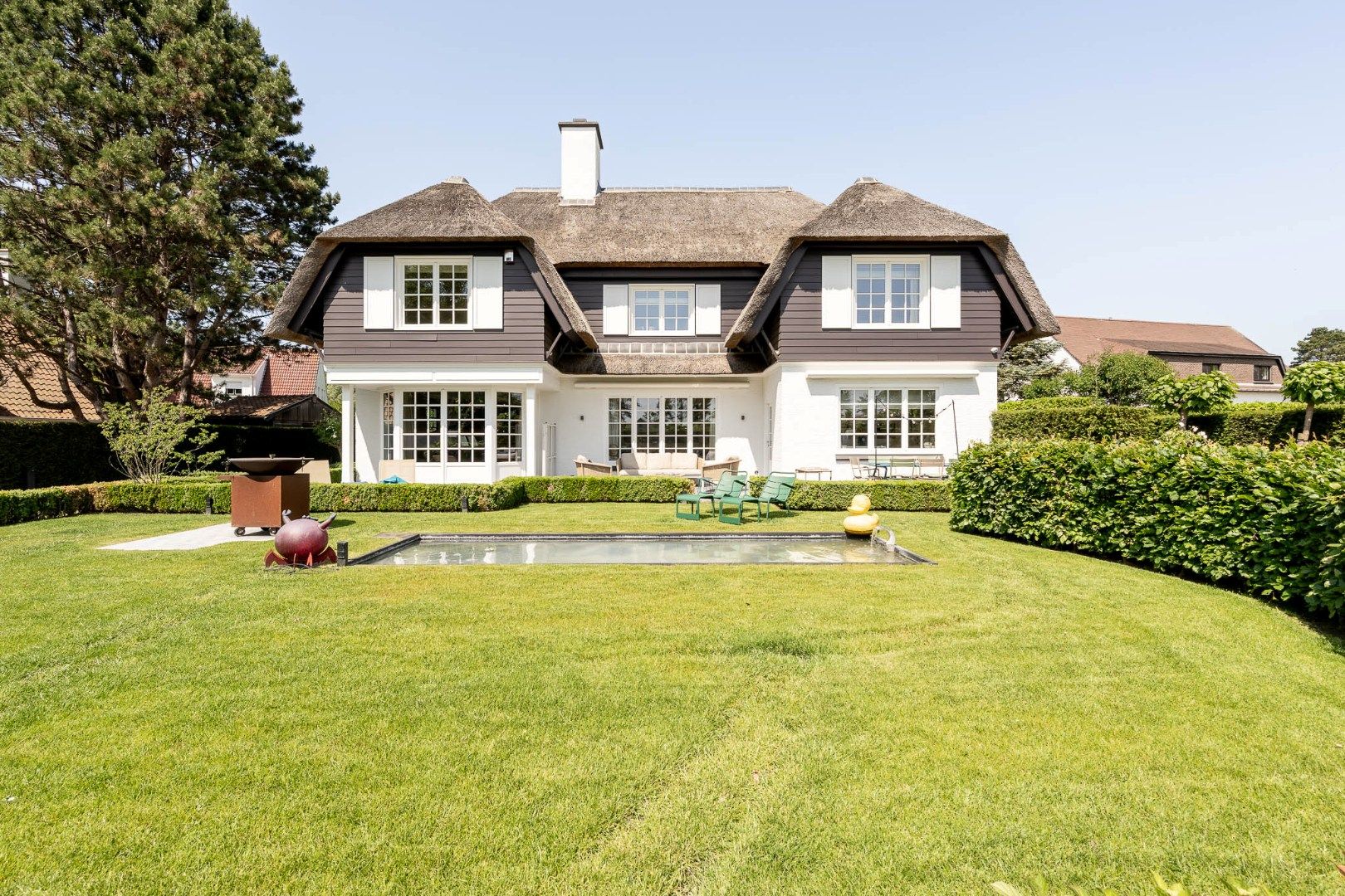 Elegante instapklare villa met zuidgerichte tuin foto {{pictureIndex}}