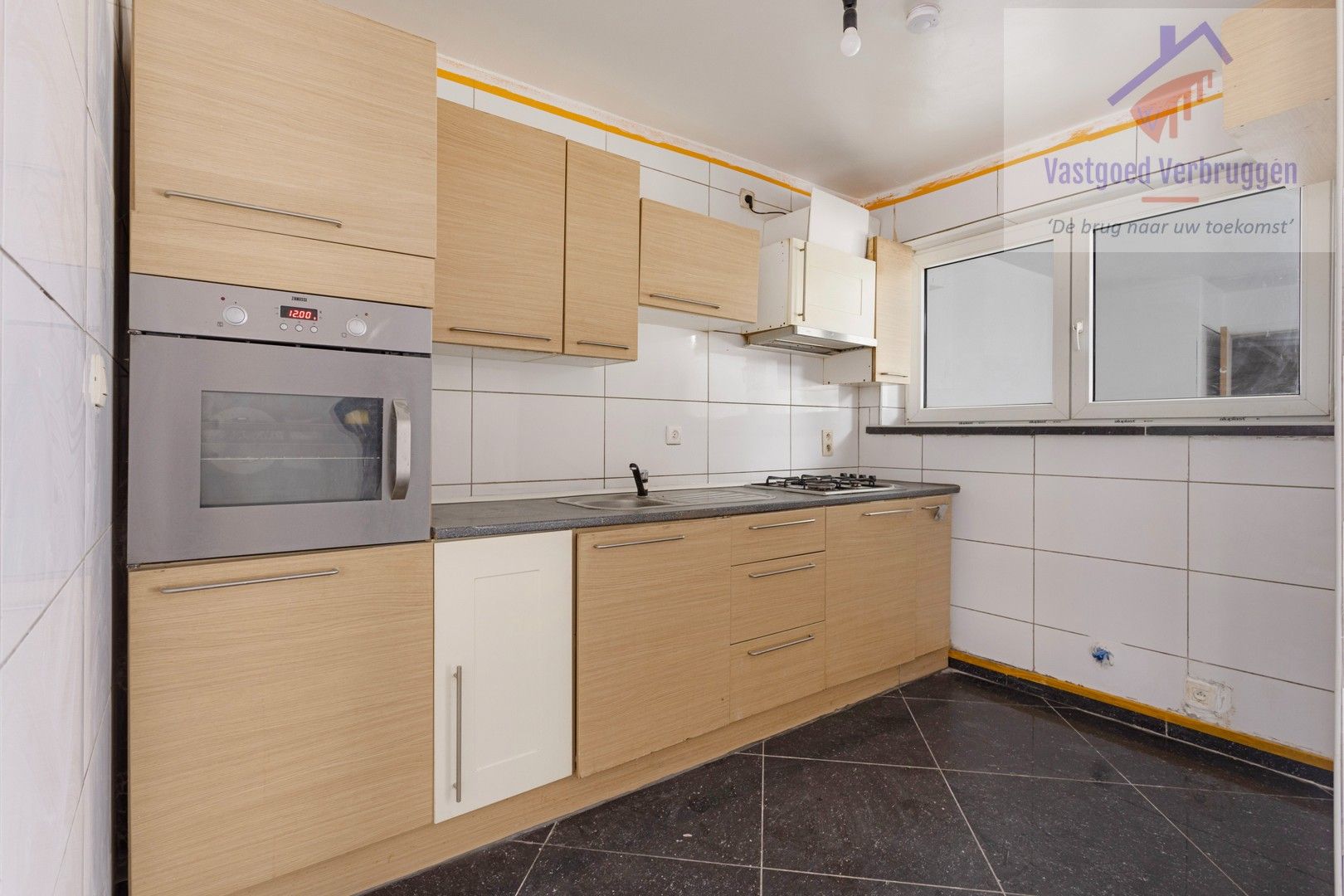 Centraal gelegen ruime woning met 5 slaapkamers, 2 badkamers en tuin! foto 4