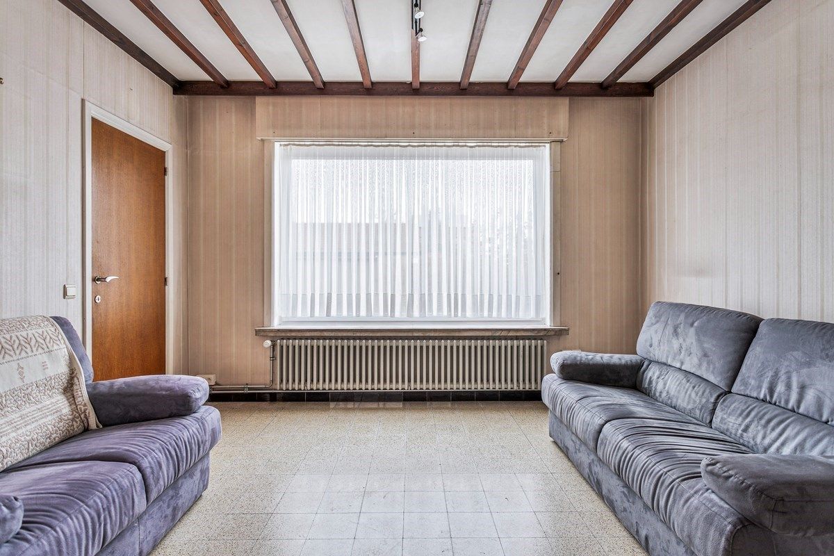 Ruime woning met 4 slaapkamers en garage! foto 3