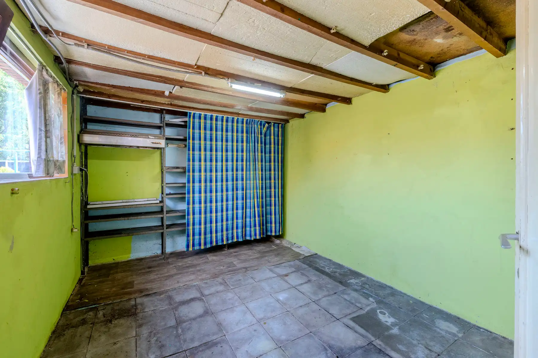 Op te frissen woning met 3 slpks, garage en gezellige tuin foto 17