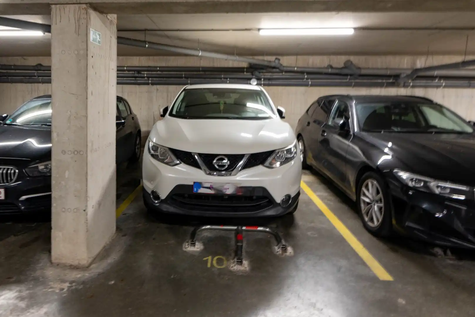 Ondergrondse autostaanplaats met privatieve kelderberging foto 2