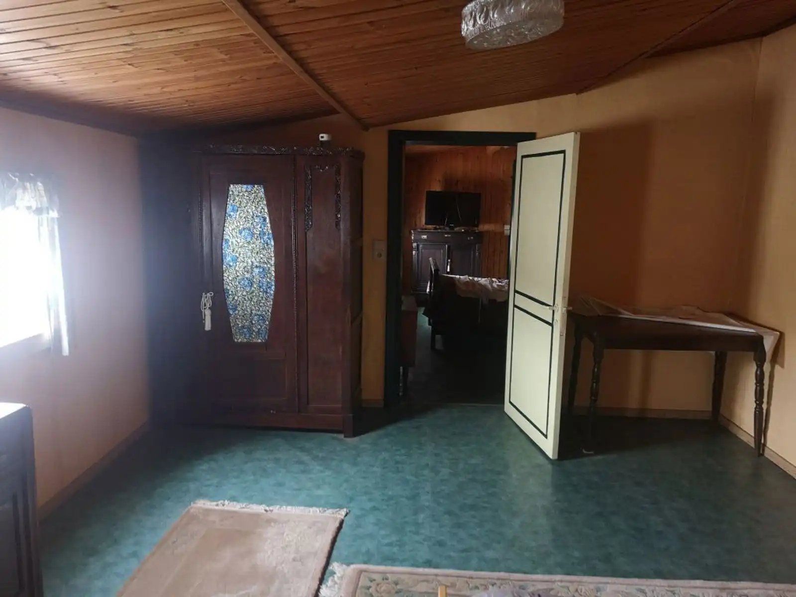 Te renoveren halfopen woning met grote naastliggende tuin foto 12