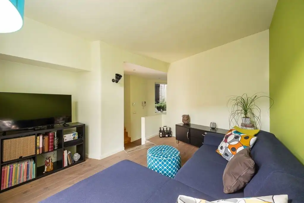 Unieke woning met eclectische gevels en dakterras foto 9