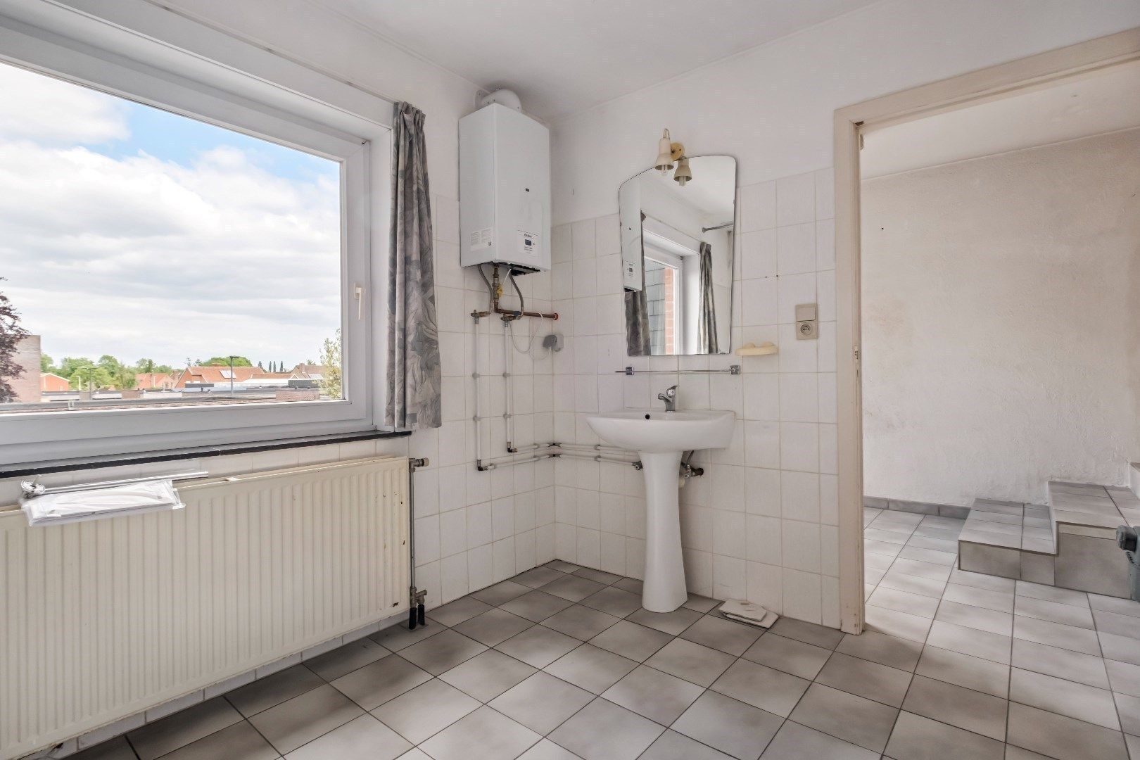 Woning met 4 slaapkamers, tuin en garage in Dadizele-centrum foto 12