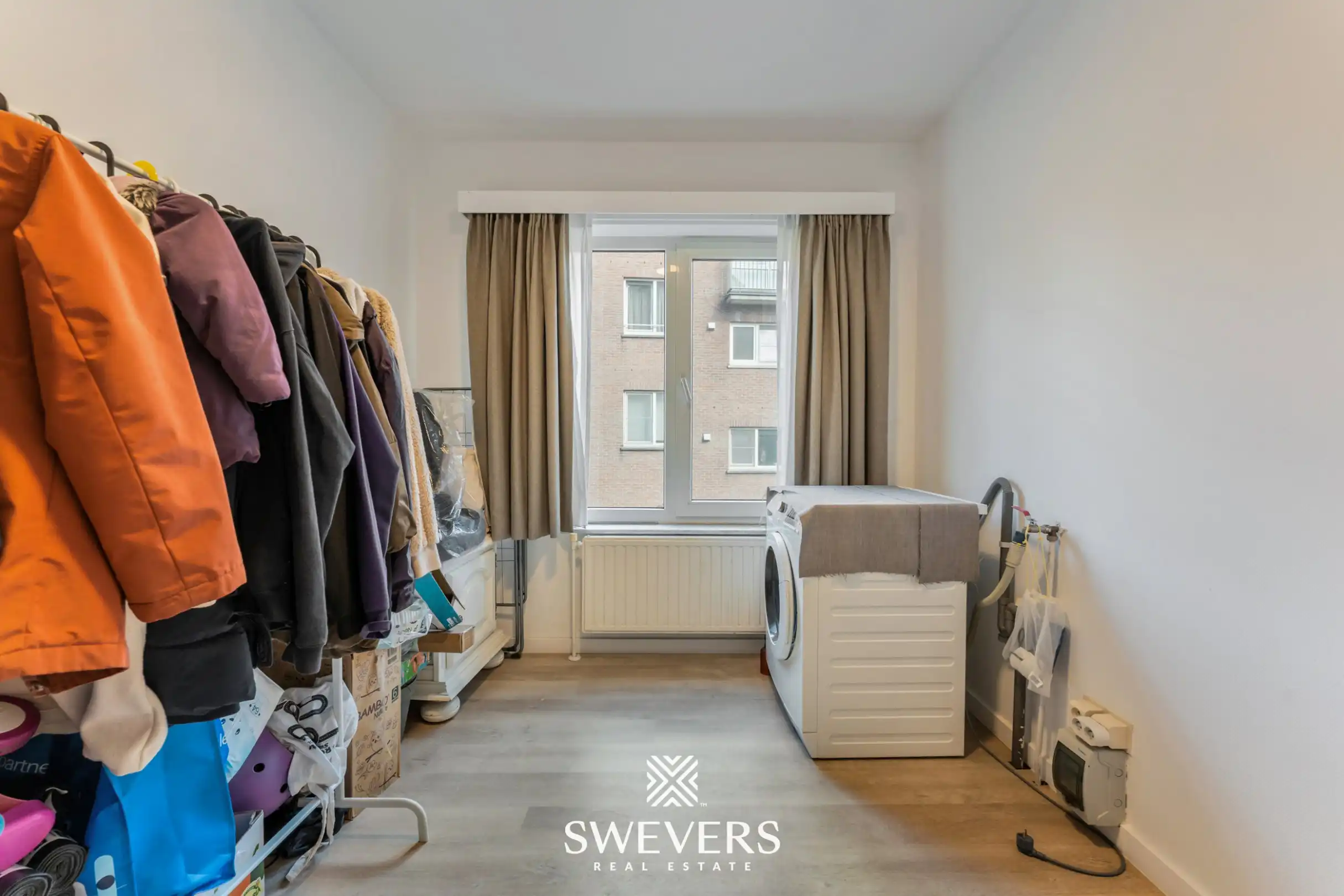 Instapklaar gelijkvloers 3-slaapkamerappartement met autostaanplaats en kelderberging nabij Hasselt-centrum foto 11