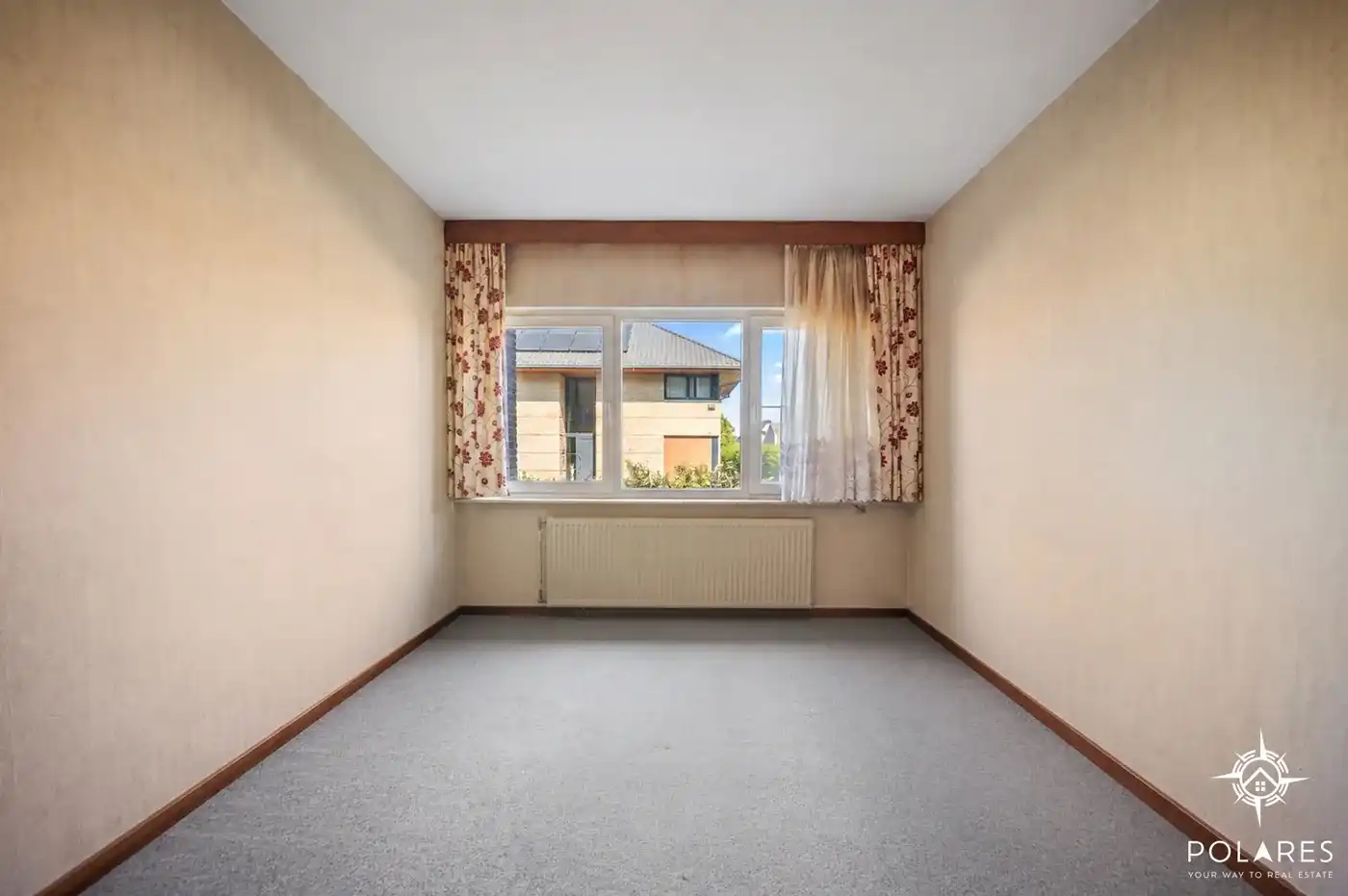 Ruim gelijkvloers appartement met 2 slaapkamers, garage en kelder foto 9