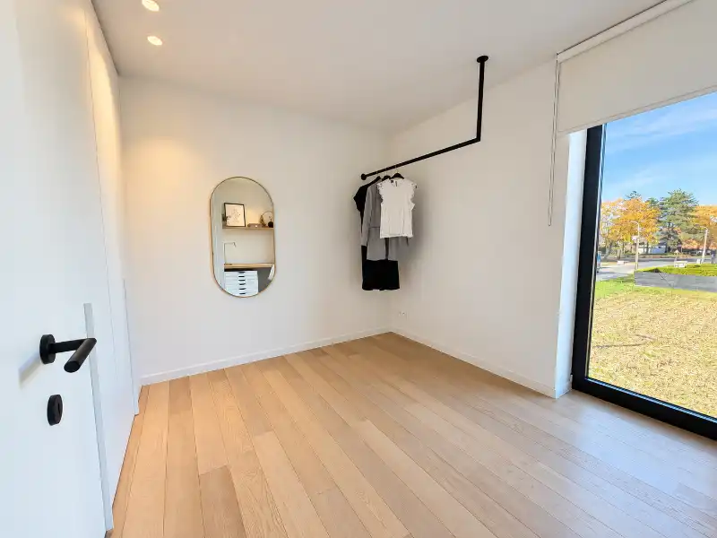 Luxueus designappartement met zuidterras, carport en ruime kelder foto 9