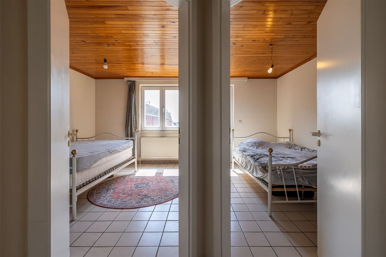 Verzorgd gebouw met handelszaak en 2 apt foto 28