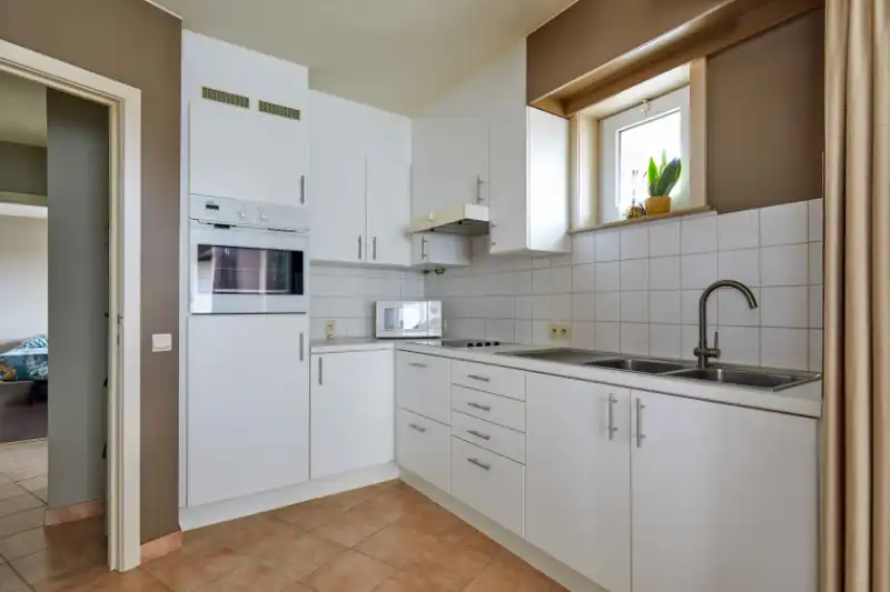 Roeselare-centrum : Instapklaar hoekappartement met 2 slaapkamers en zonnig terras in hartje Roeselare. foto 6