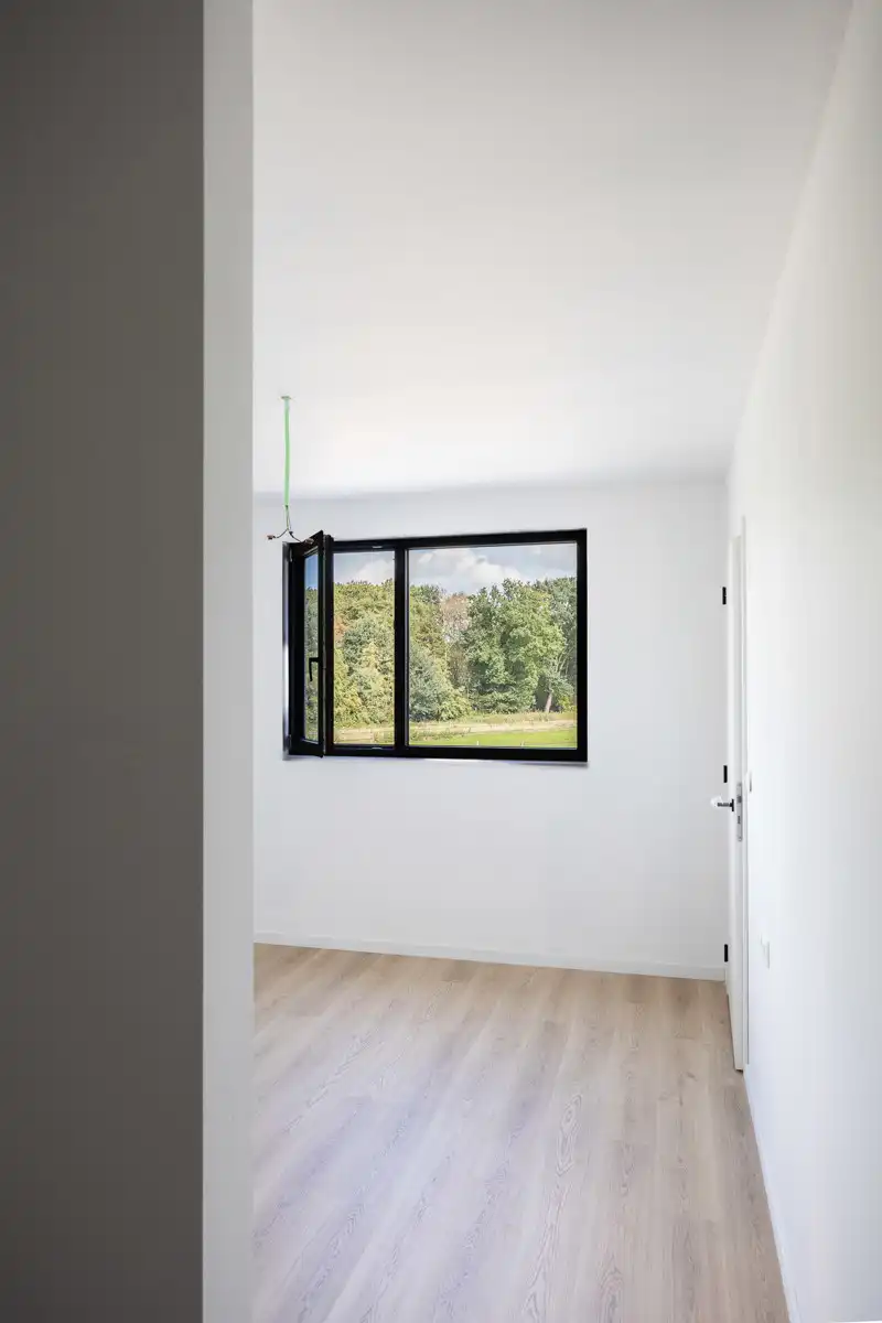 Moderne BEN-woning met zicht op groen foto 16