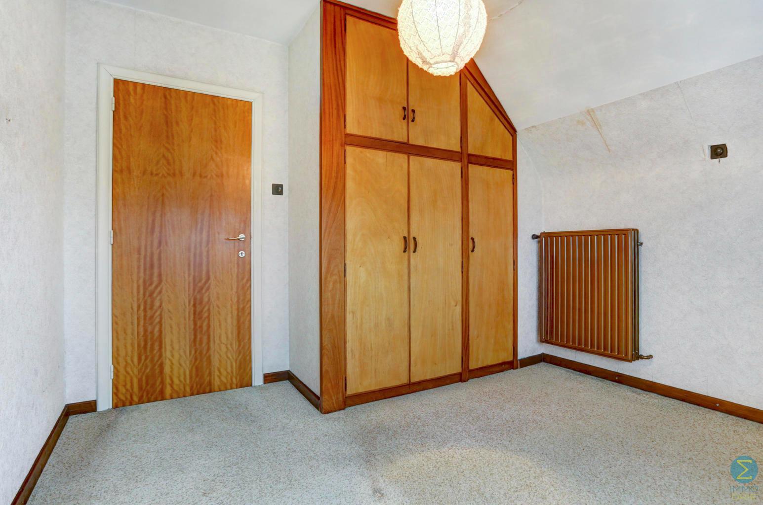 Te renoveren vrijstaande woning met 4 slpks op 898m² grond. foto 19