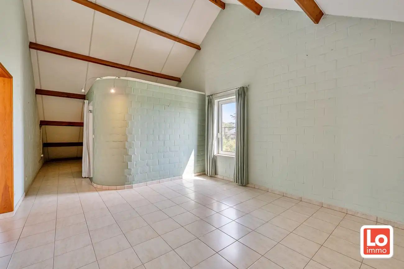 Degelijke open (kangoeroe)woning met inpandige garage en gezellige zuidwest georiënteerde tuin op een rustige locatie nabij het centrum van Lochristi! foto 27