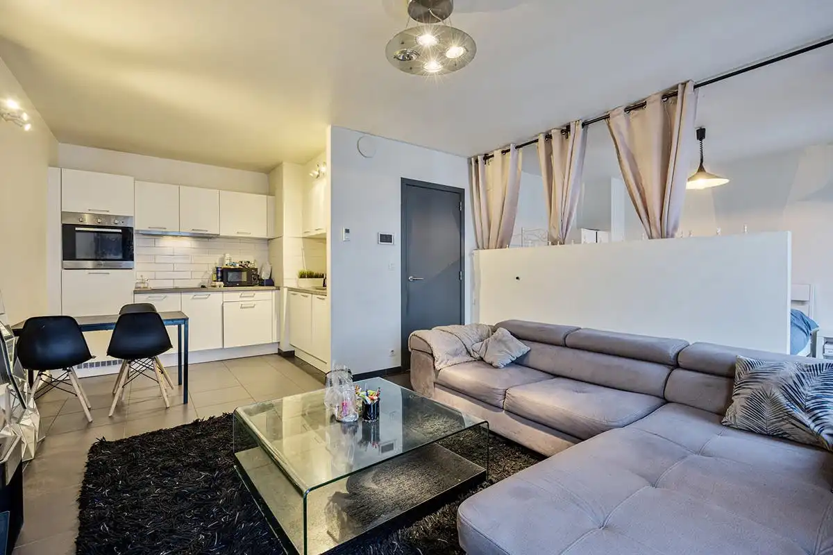 Penthouse Studio met zicht op Tour & Taxis te koop foto {{pictureIndex}}