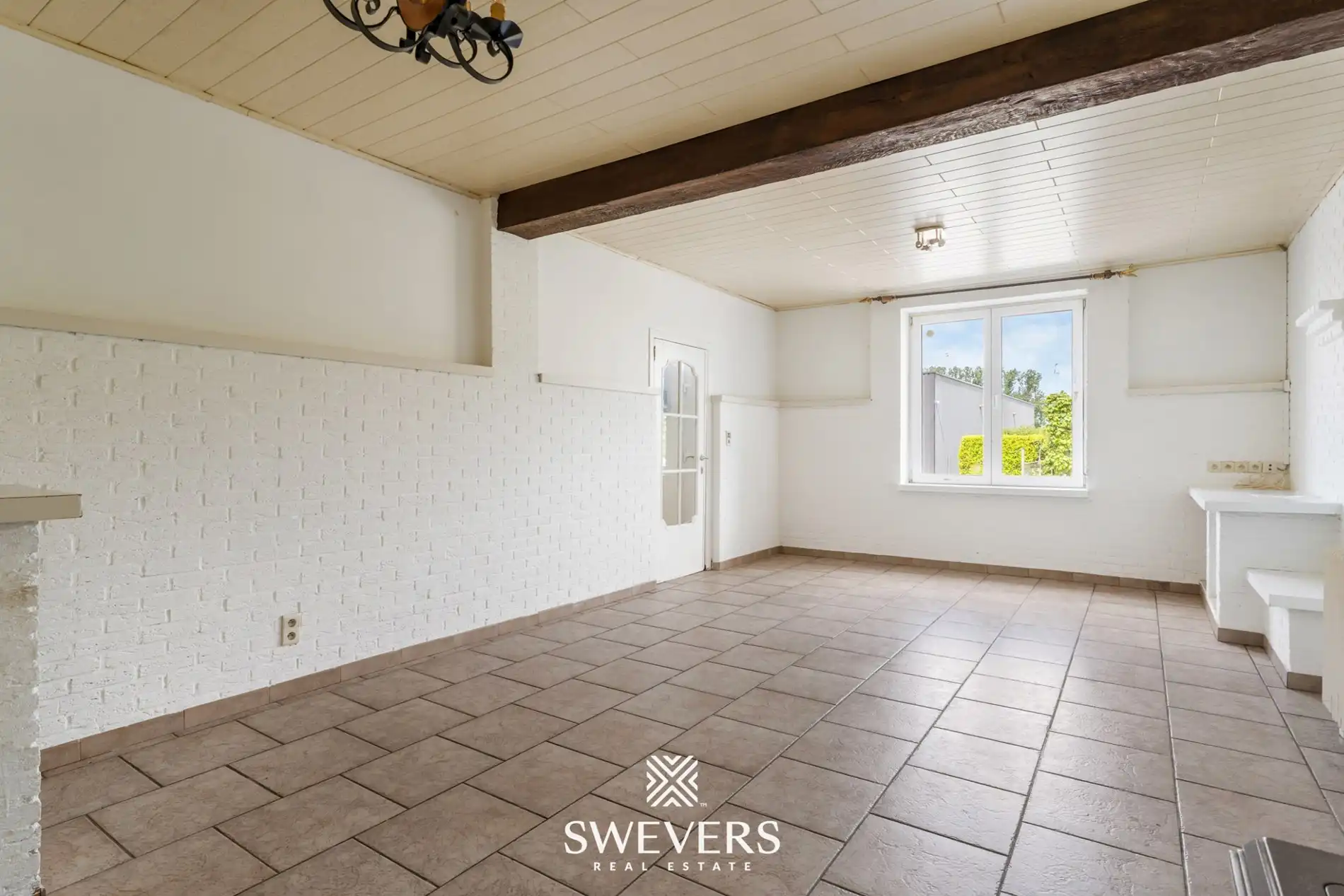 Charmante open bebouwing met 3 slaapkamers, zonnige tuin en renovatiepotentieel foto 3