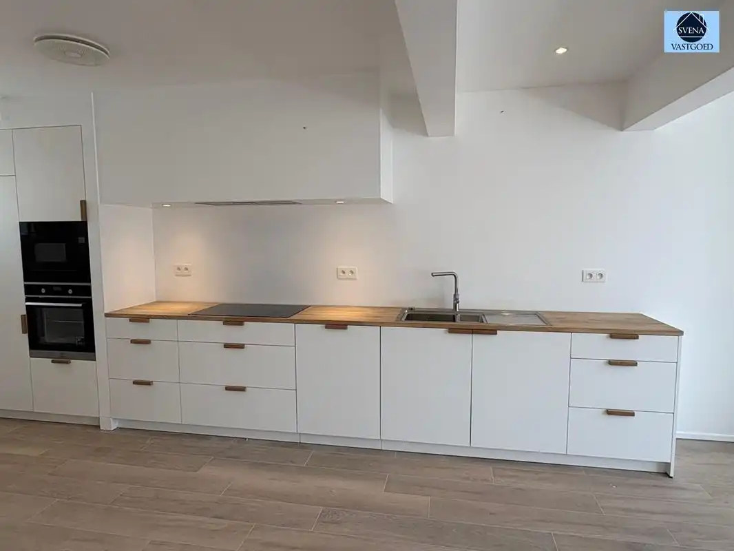 GERENOVEERD APPARTEMENT MET 2 SLAAPKAMERS foto {{pictureIndex}}