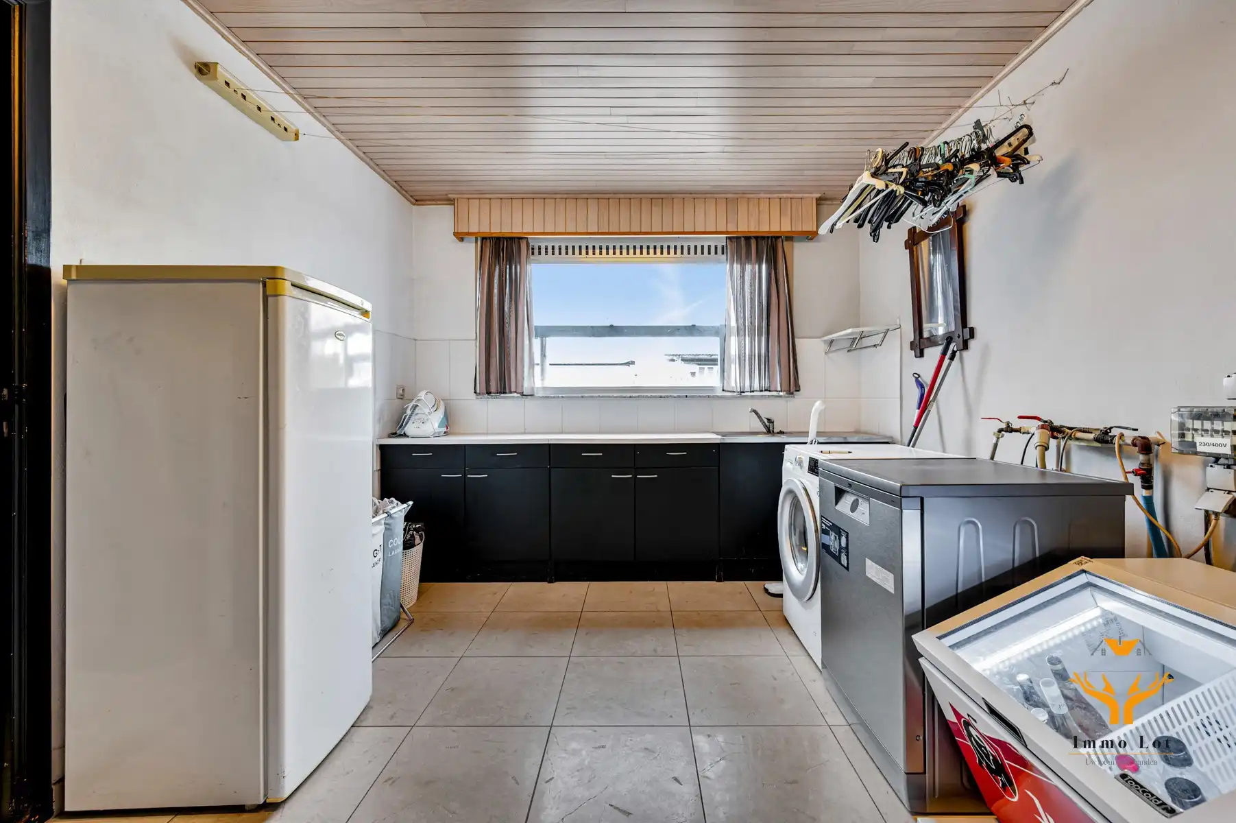 Halfopen bebouwing met tuin en garage in centrum Kalken foto 20