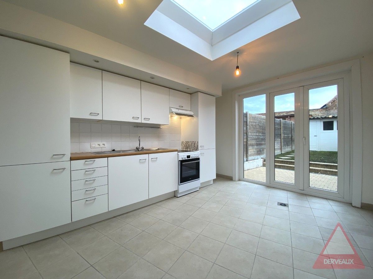 Heule – Woning met tuin op centrale ligging foto 7