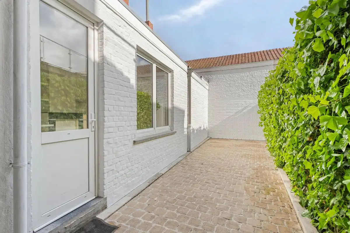 Bel-etage met 2 slaapkamers te koop op de Dam te Kortrijk! foto 14