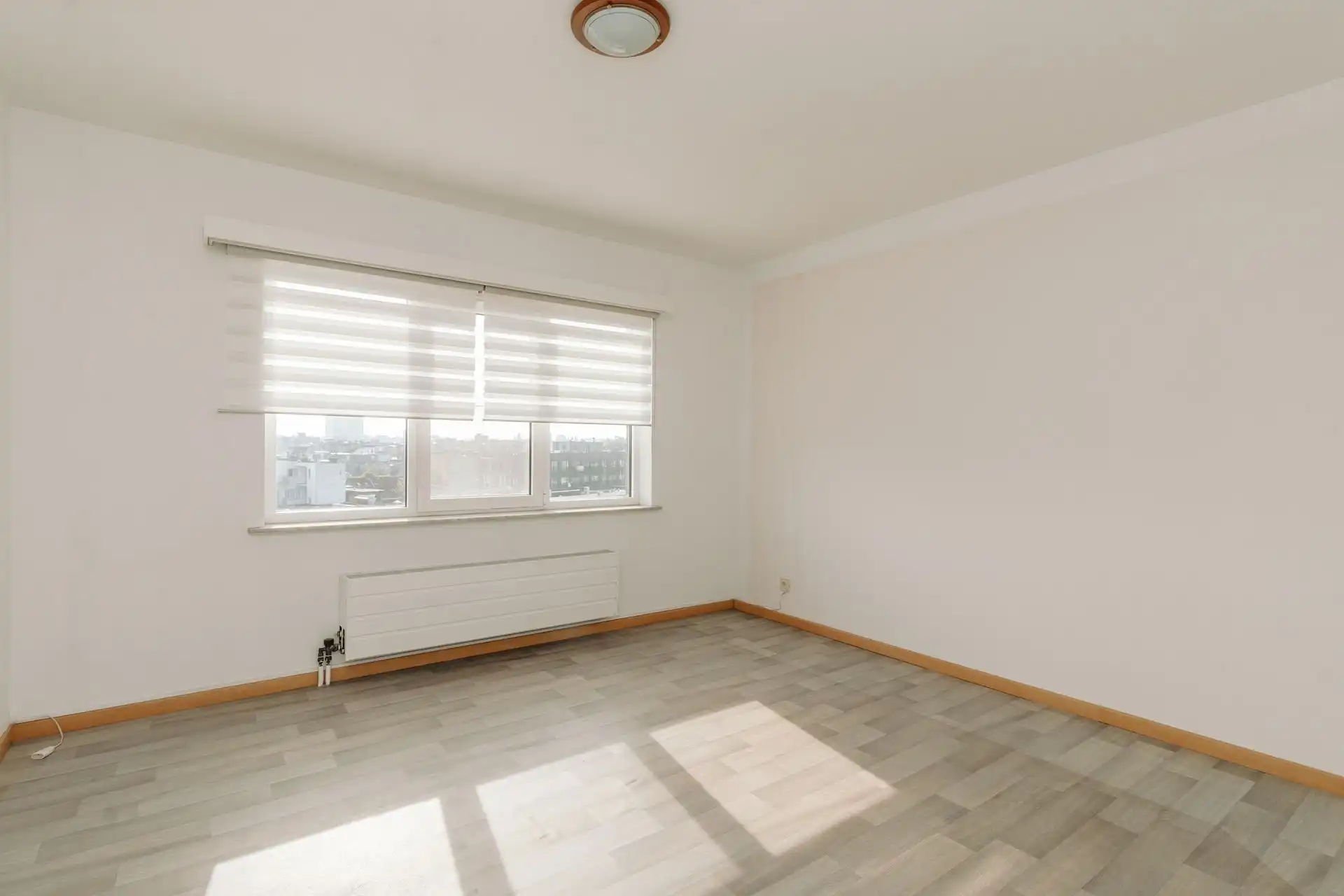 Lichtrijk appartement met 2 slaapkamers & staanplaats foto 10