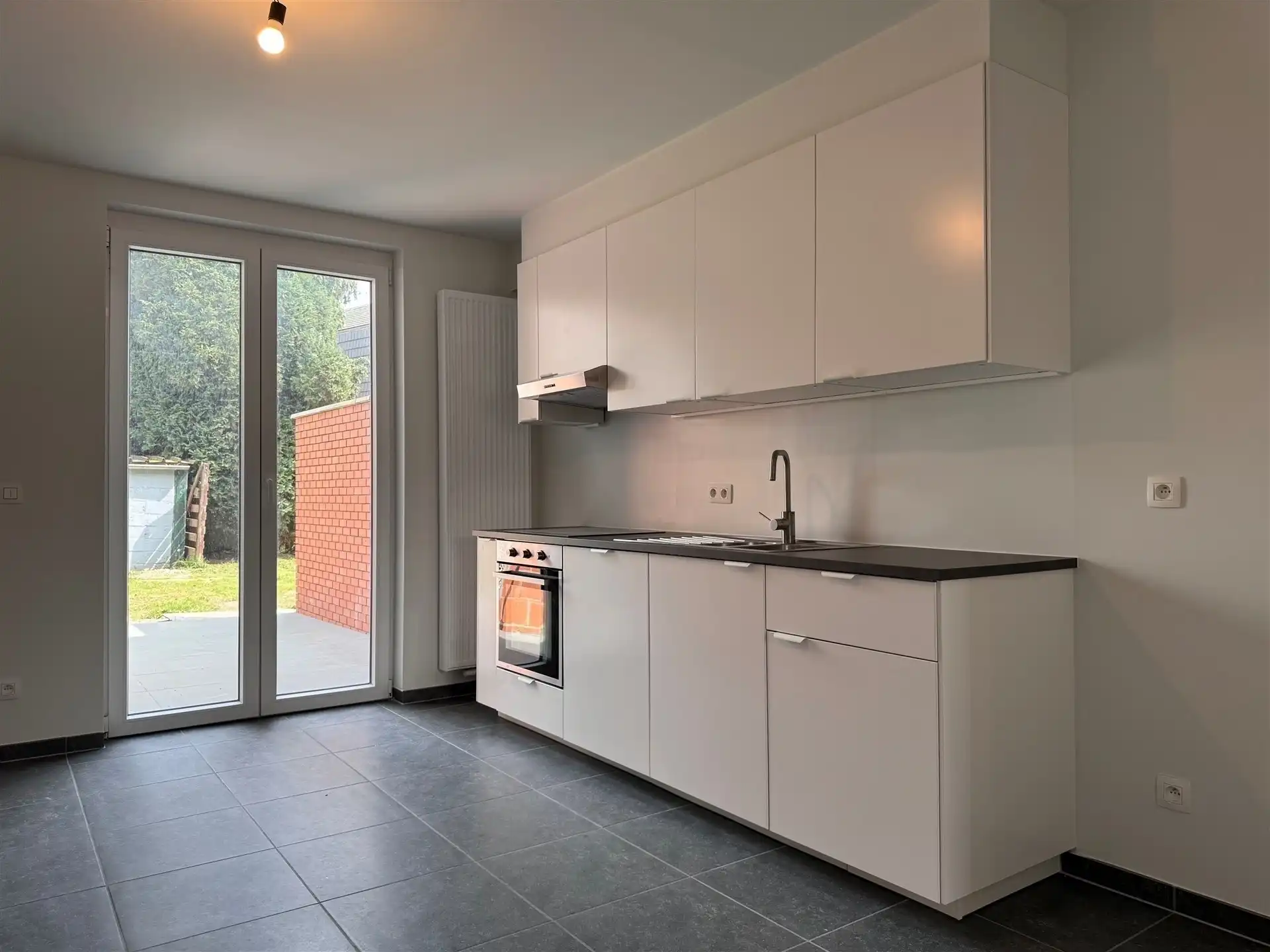 Gunstig gelegen woning met 4 slaapkamers en tuin. foto 11