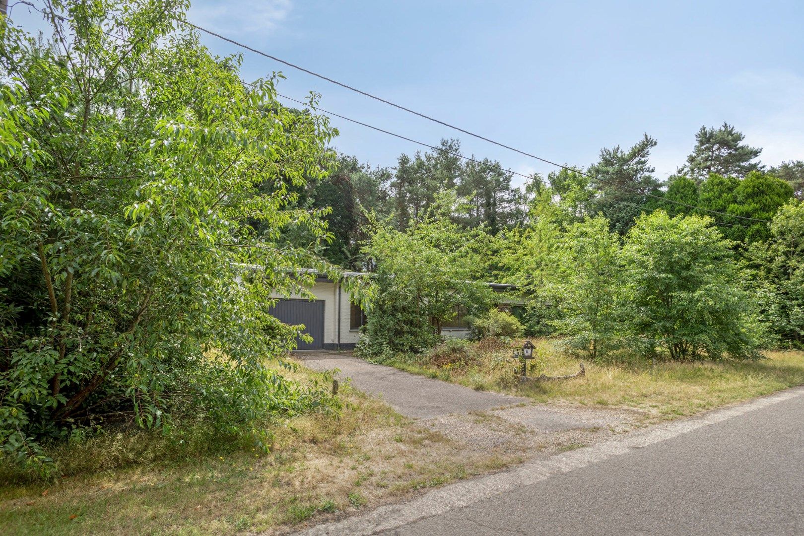 Te renoveren / te slopen woning op een uniek gelegen perceel van 1.693 m² ! foto 15