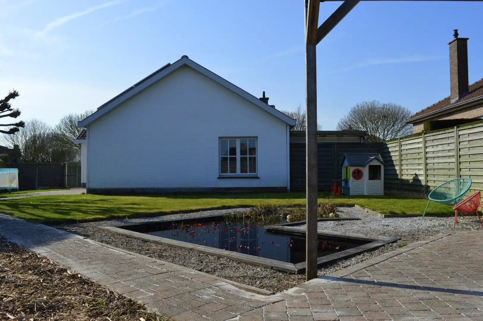 Instapklare woning met 3 slaapkamers, garage en een mooi stukje tuin te koop in residentiële wijk te Aalbeke foto 21