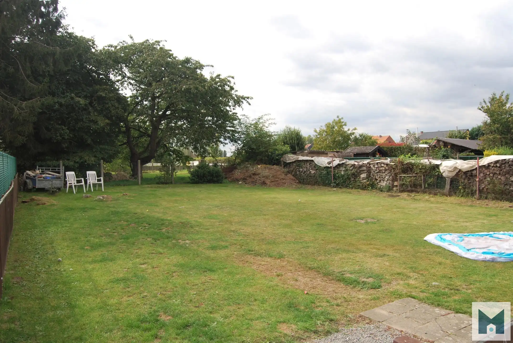 Ruim gerenoveerd app. met 3 slpks, een garage en gem. tuin! foto 12