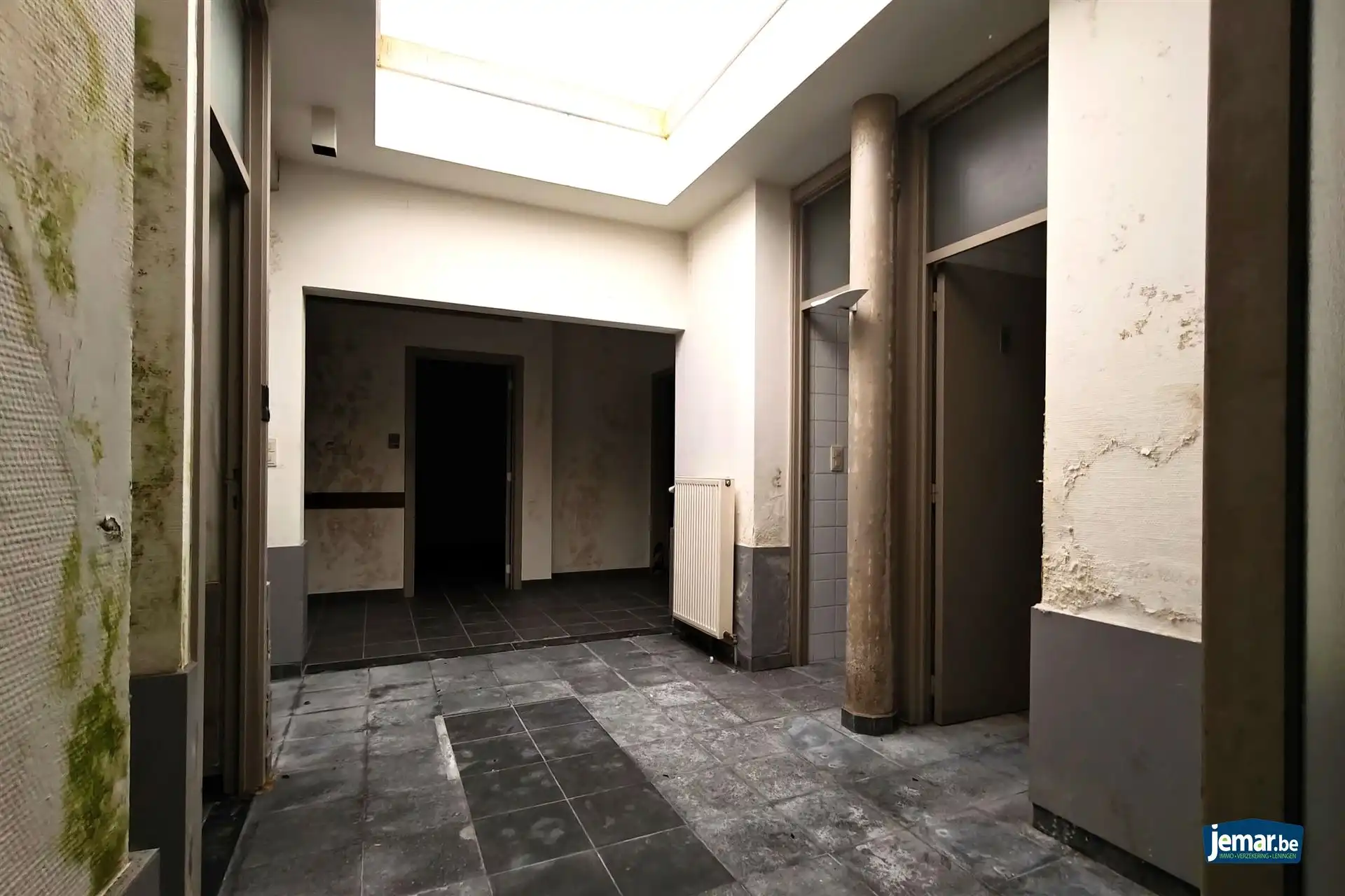 Te renoveren kantoorgebouw (311m²) in het historisch centrum van Borgloon foto 5