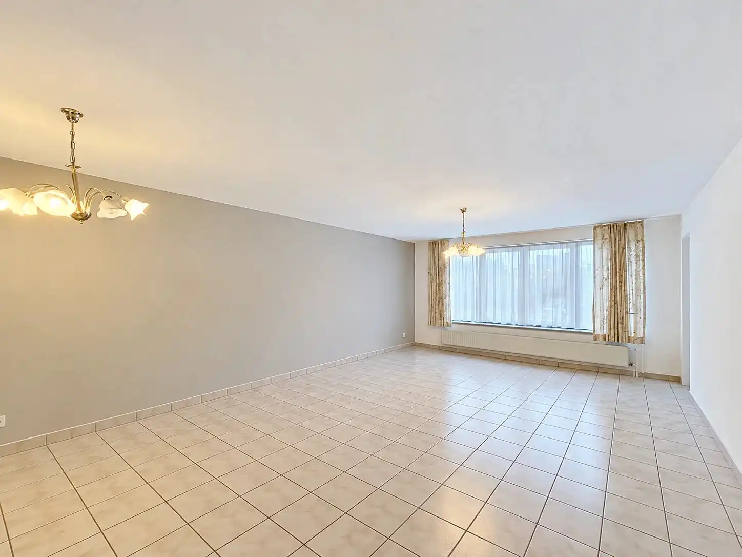 Ruim appartement met 2 slaapkamers, 2 staanplaatsen en 3 kelders foto 3