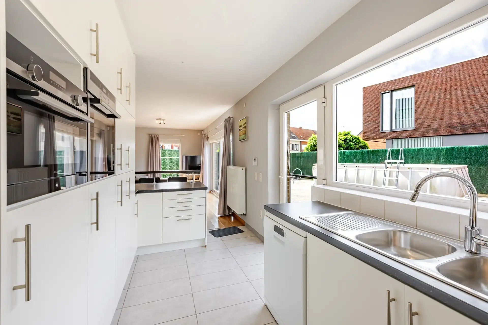 Instapklare halfopen bebouwing met 3 slaapkamers, zonnepanelen en zonnige tuin te Aalst foto 10