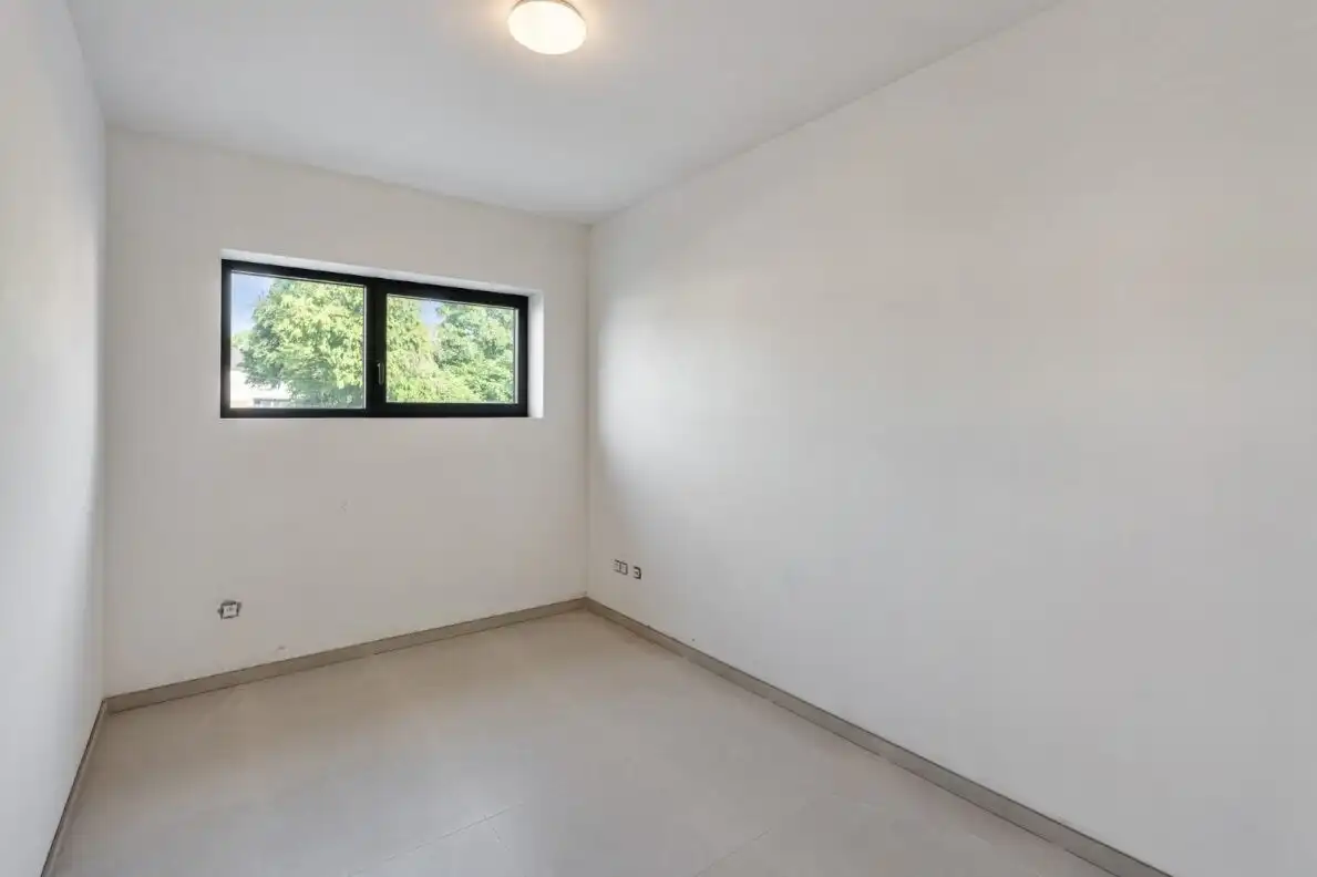 TE KOOP – Ruim nieuwbouw gelijkvloers appartement met tuin en garage in het centrum van Helchteren foto 10