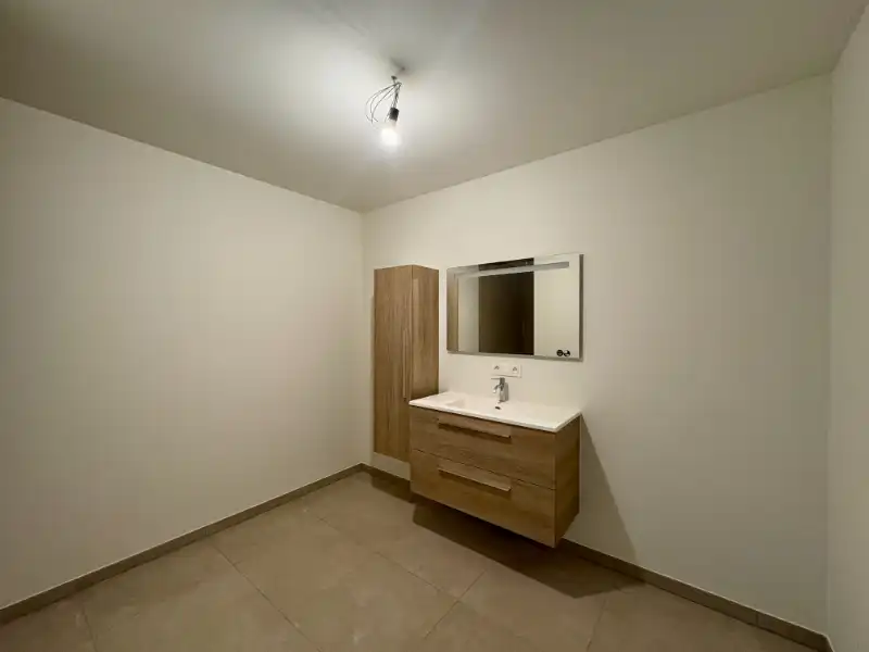 Gelijkvloers nieuwbouwappartement met 3 slaapkamers en terras foto 8