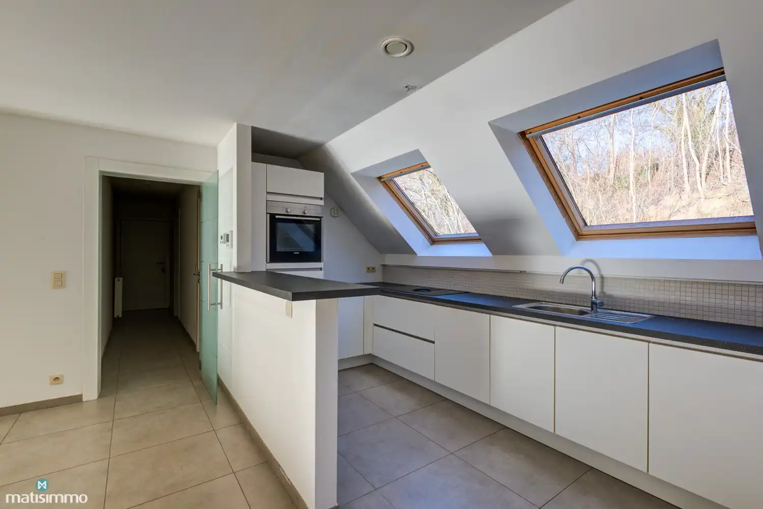 DUPLEXAPPARTEMENT MET 3 SLAAPKAMERS, TERRAS EN ONDERGRONDSE AUTOSTAANPLAATS NABIJ HET CENTRUM VAN BILZEN foto 5