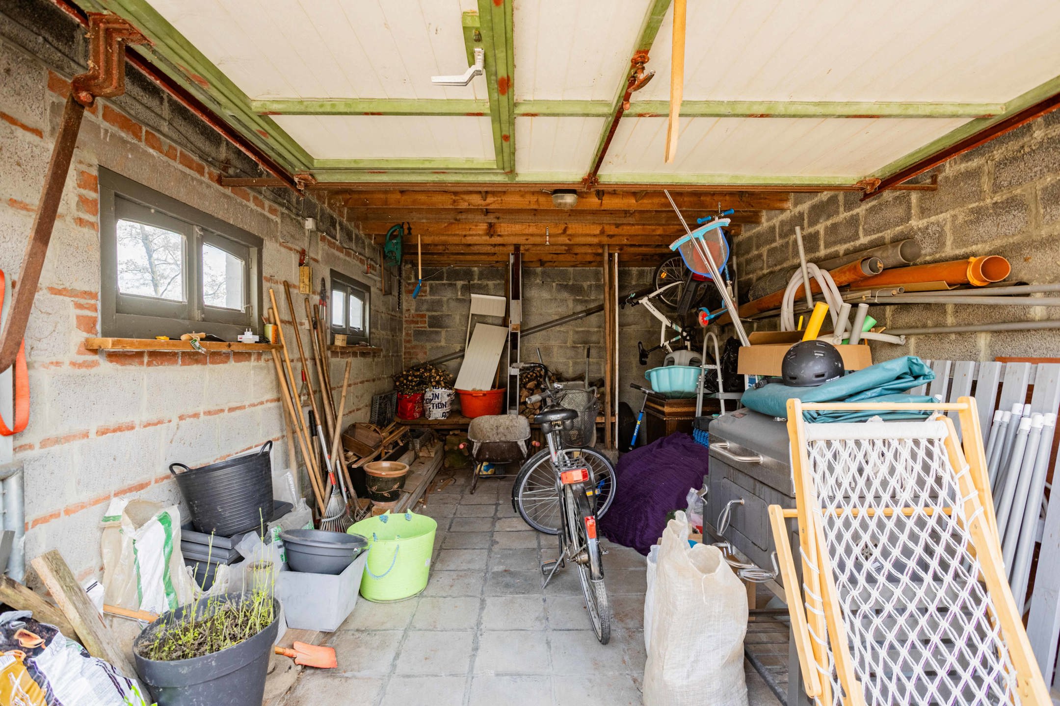 Gunstig gelegen halfopen bebouwing met grote tuin. foto 21