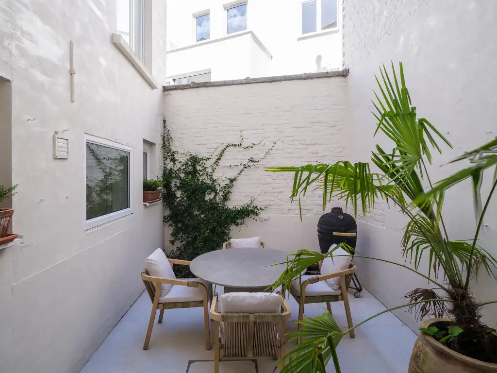 Stijlvolle townhouse met karaktervolle art-nouveaugevel op een gegeerde locatie nabij het Baudelohof. foto 4