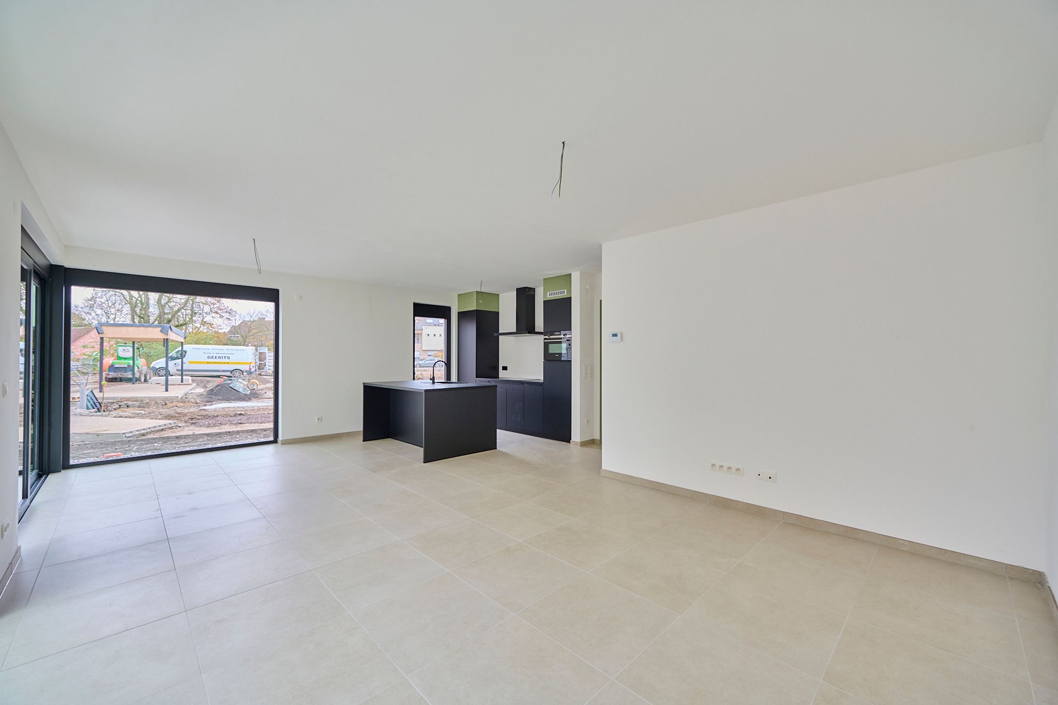 Gelijkvloers nieuwbouwappartement + privé tuintje foto 3