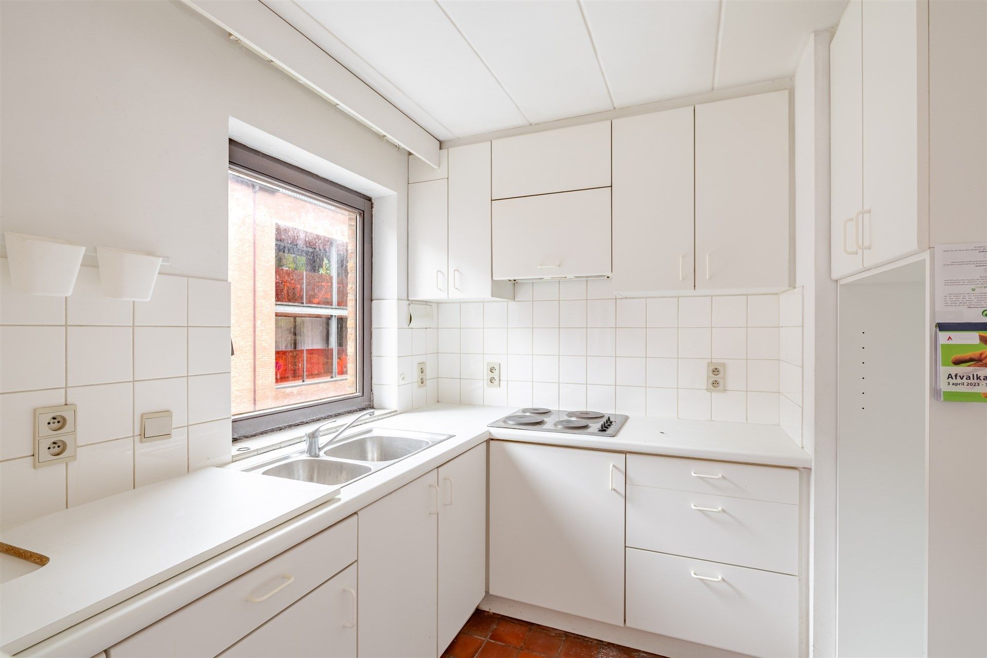 Opbrengsteigendom bestaande uit 4 appartementen + 22 garageboxen + magazijn/werkplaats foto 3