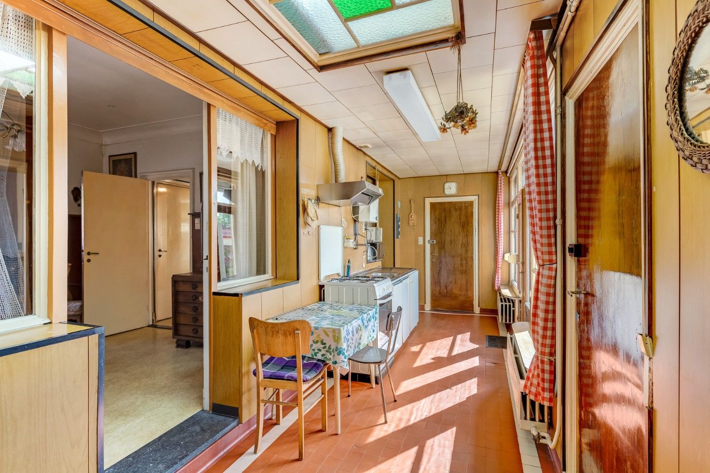 Te renoveren, geklasseerde art deco woning met 3 slpk, ruime zolder en Z-tuin foto 13