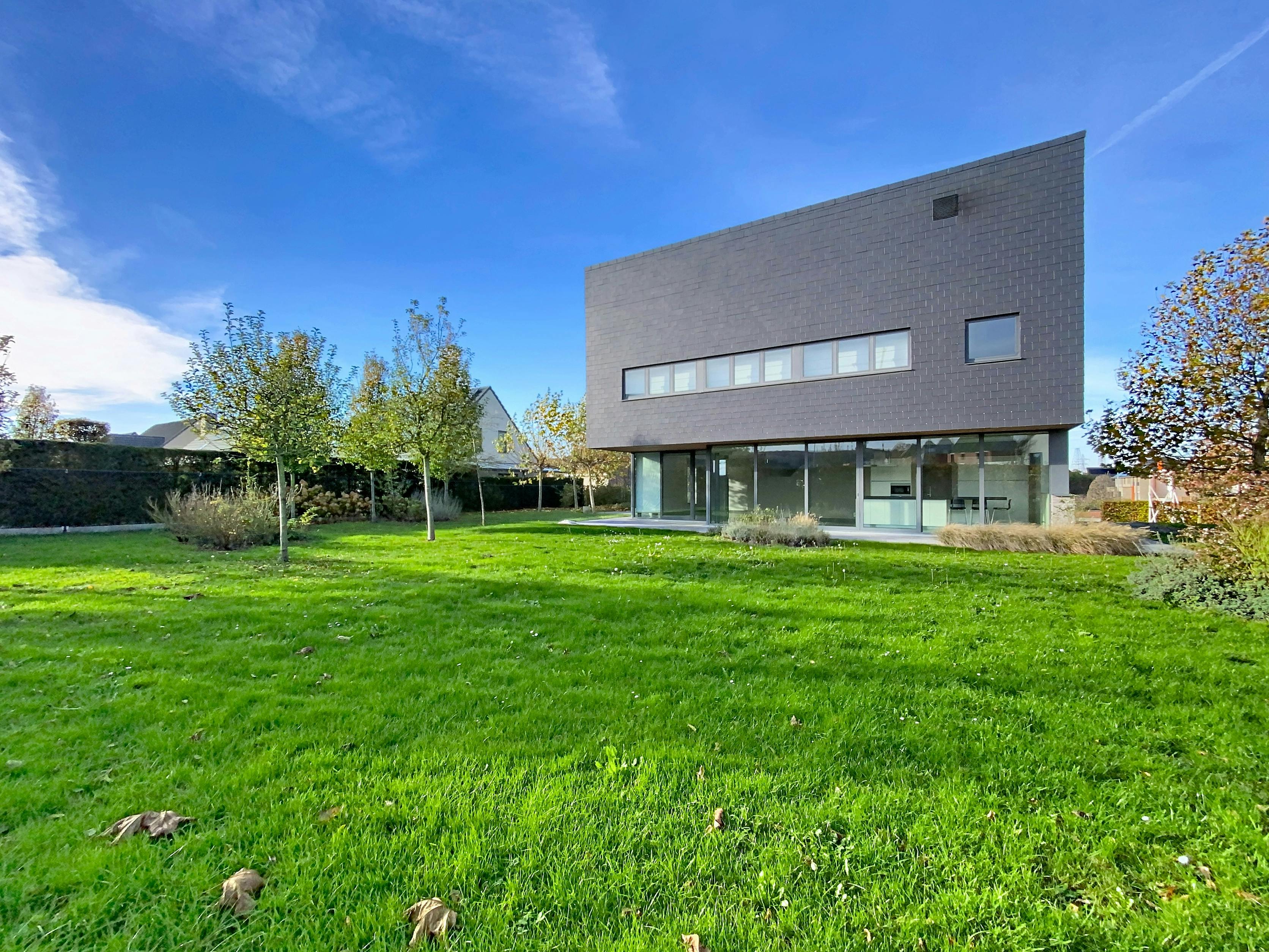 Instapklaar huis met 4 slaapkamers en ruime tuin in Kluisbergen foto 17