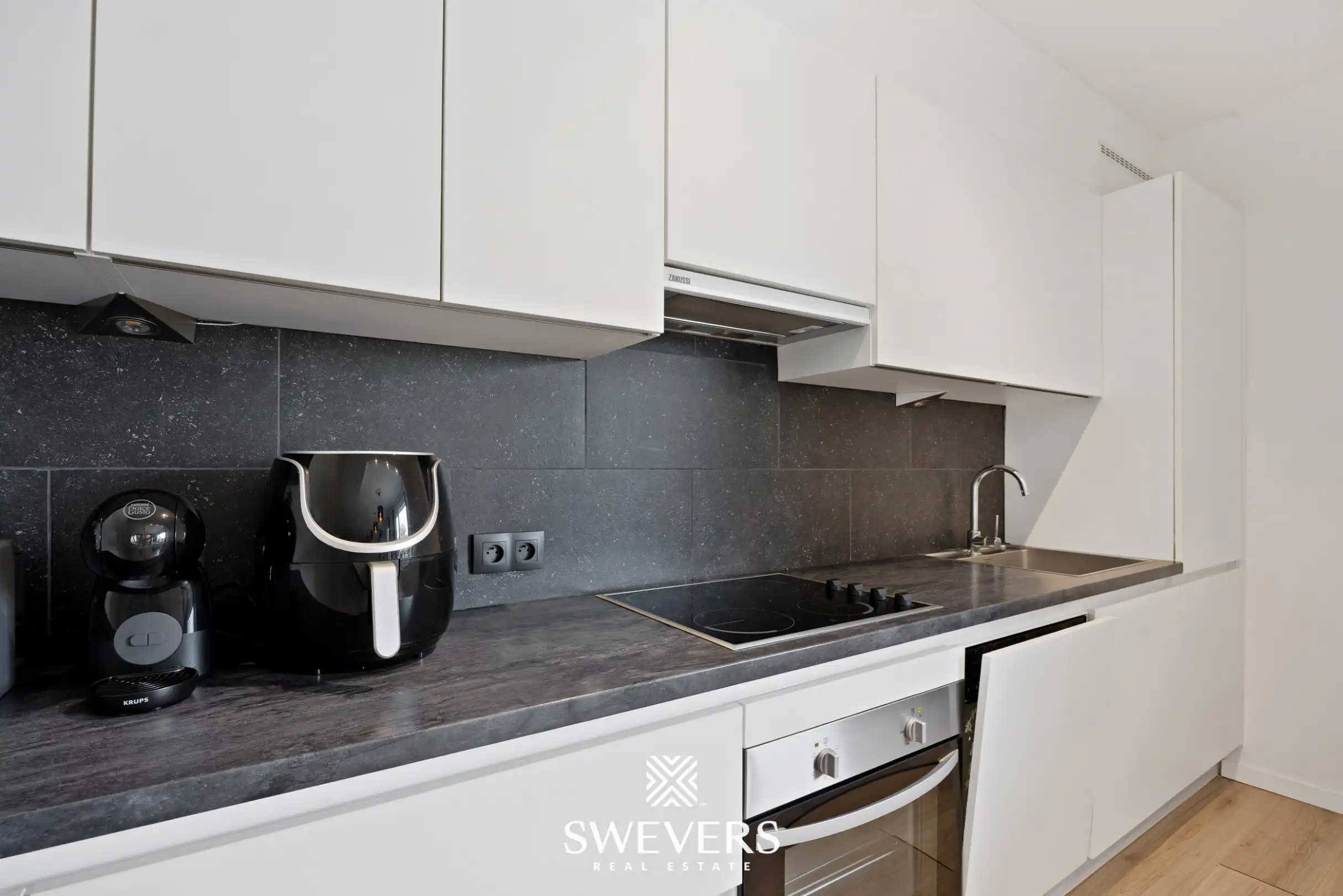Uitstekend gelegen en instapklaar appartement met 2 slaapkamers te Genk foto 12