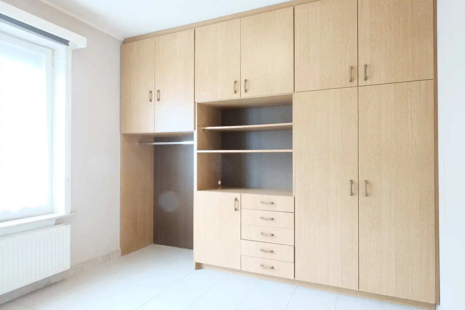 Centraal gelegen gelijkvloers 2-slaapkamerappartement — ideaal als starter of opbrengsteigendom foto 10