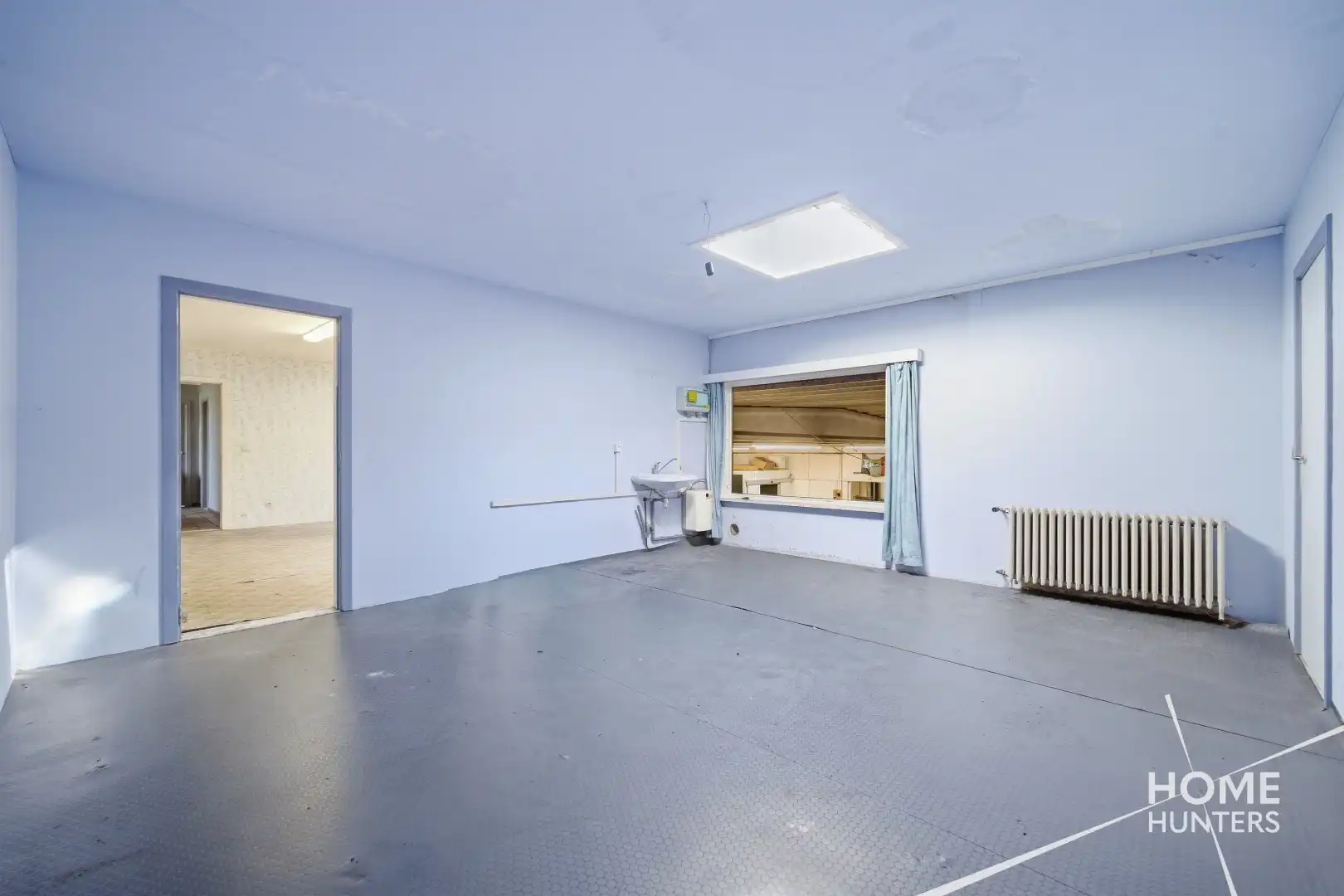 UITZONDERLIJK BEDRIJFSGEBOUW MET 2.268 M² LOODSRUIMTE EN 528 M² KANTOREN IN IEPER foto 34